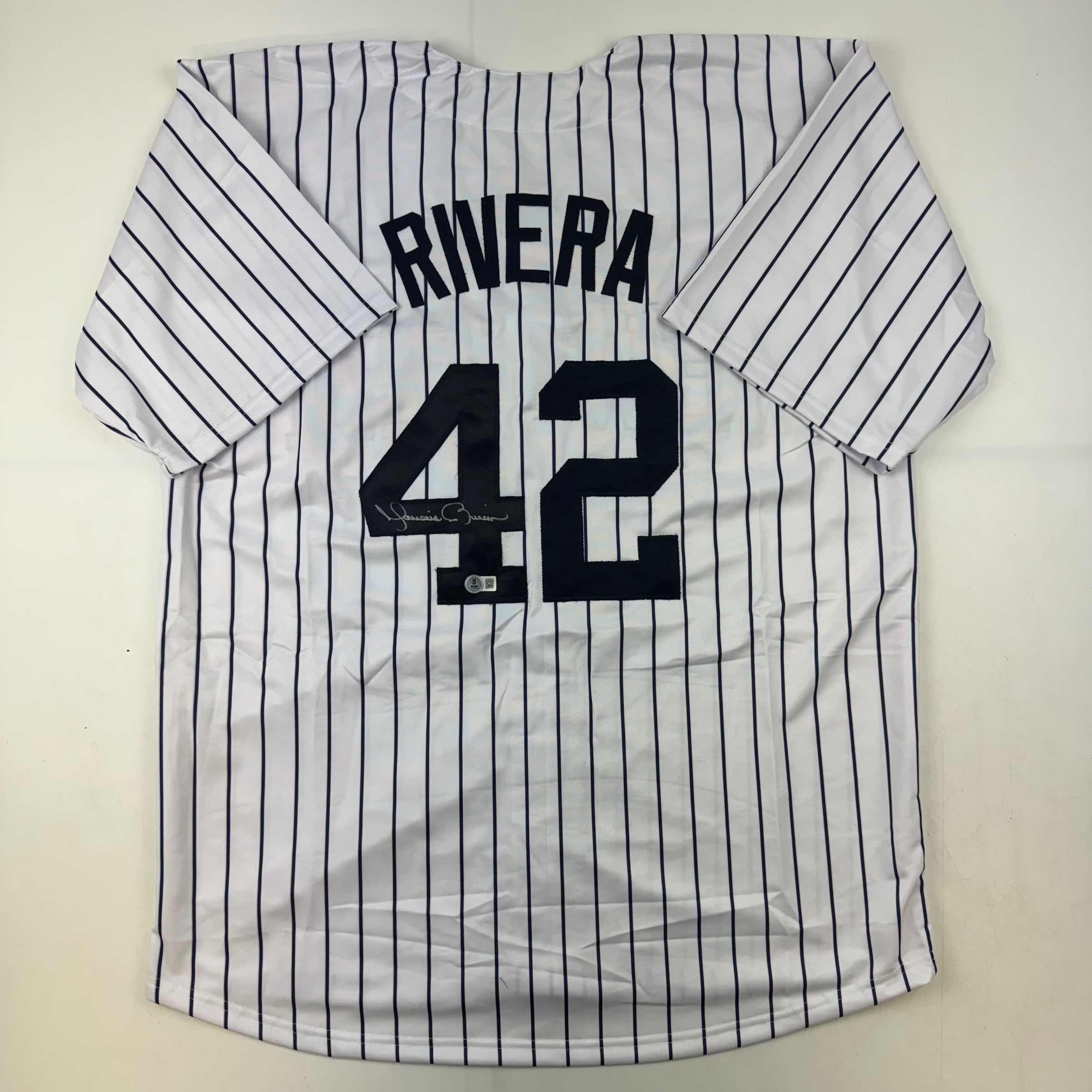 autographed-signed-mariano-rivera-new-york-pinstripe-baseball-jersey-beckett-bas-coa-holo