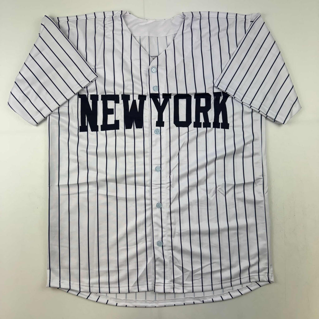 autographed-signed-mariano-rivera-new-york-pinstripe-baseball-jersey-beckett-bas-coa-holo