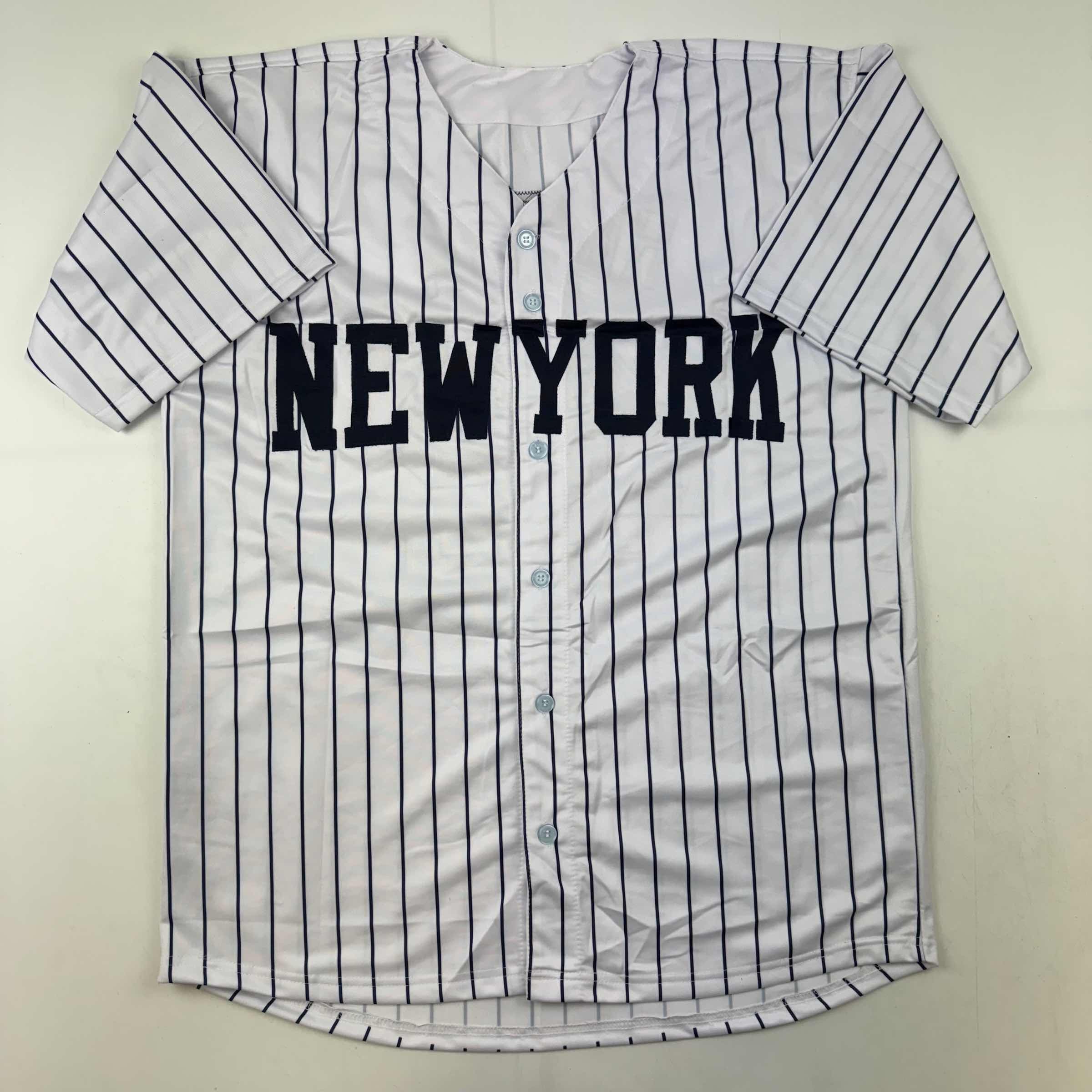 autographed-signed-mariano-rivera-new-york-pinstripe-baseball-jersey-beckett-bas-coa-holo