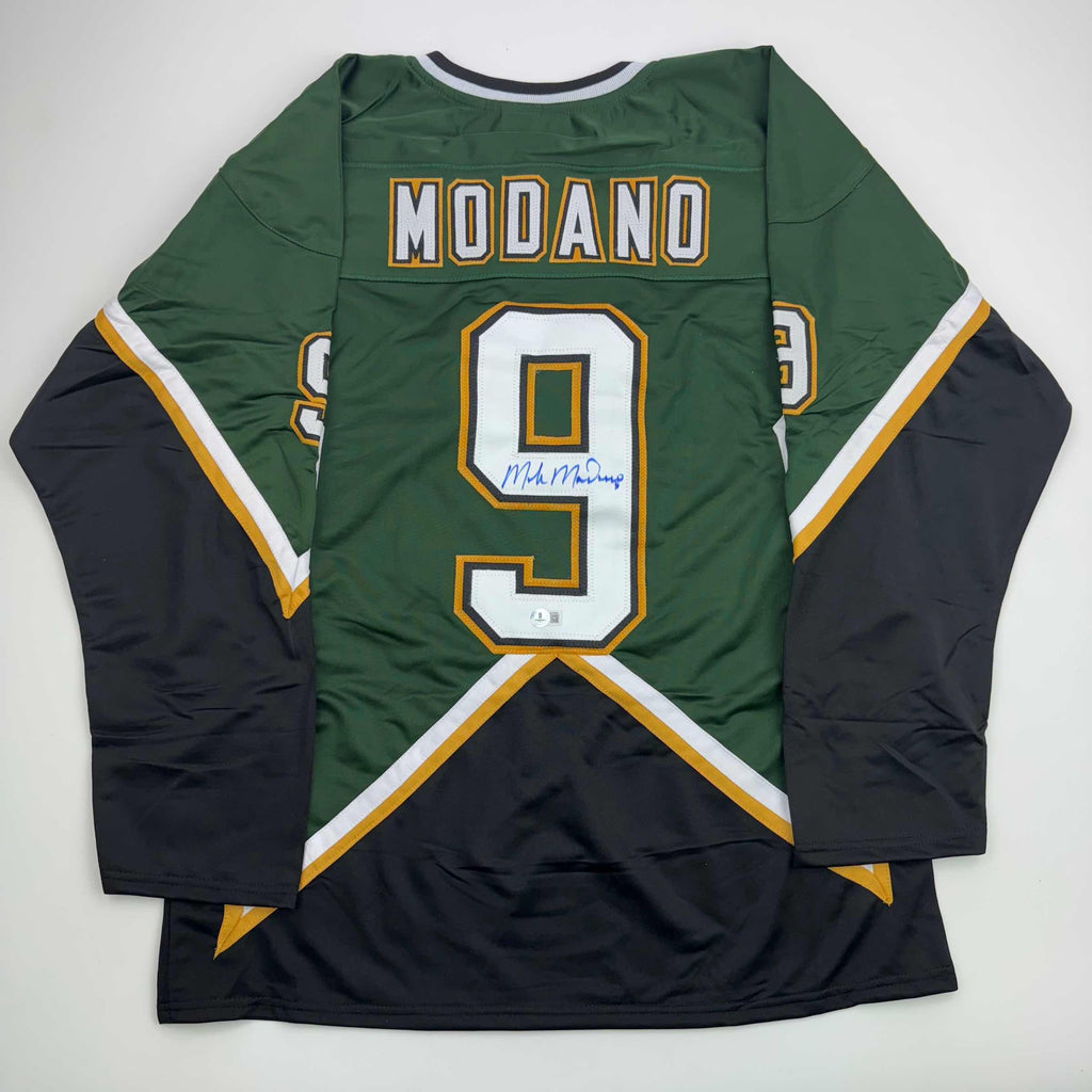 autographed-signed-mike-modano-dallas-dark-green-hockey-jersey-beckett-bas-coa