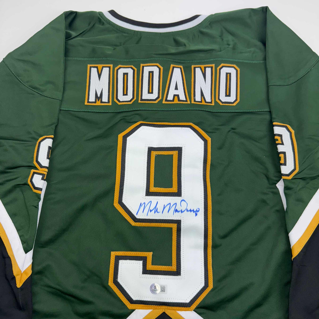 autographed-signed-mike-modano-dallas-dark-green-hockey-jersey-beckett-bas-coa