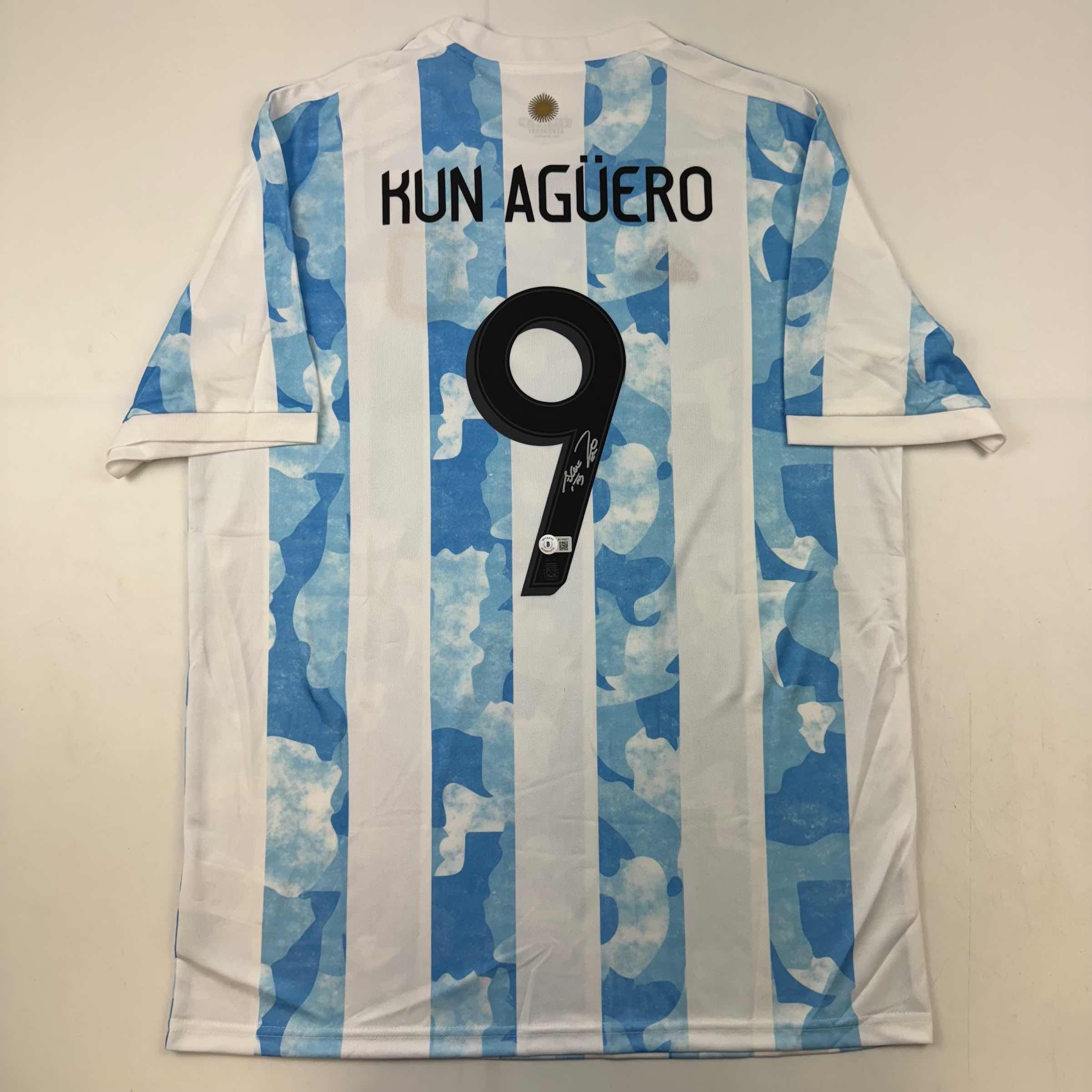 autographed-signed-sergio-kun-aguero-2021-argentina-home-blue-soccer-futbol-jersey-beckett-bas-coa