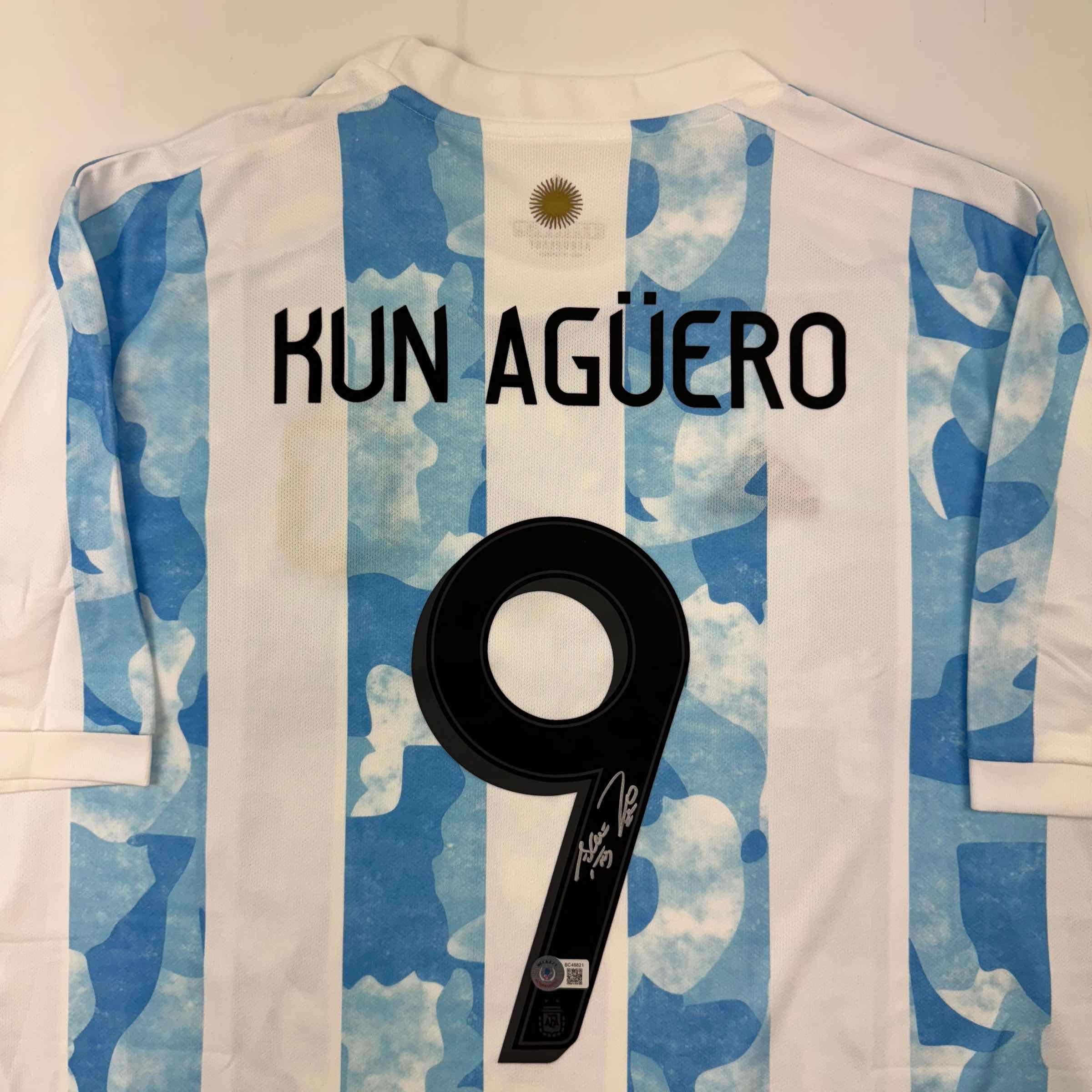 autographed-signed-sergio-kun-aguero-2021-argentina-home-blue-soccer-futbol-jersey-beckett-bas-coa