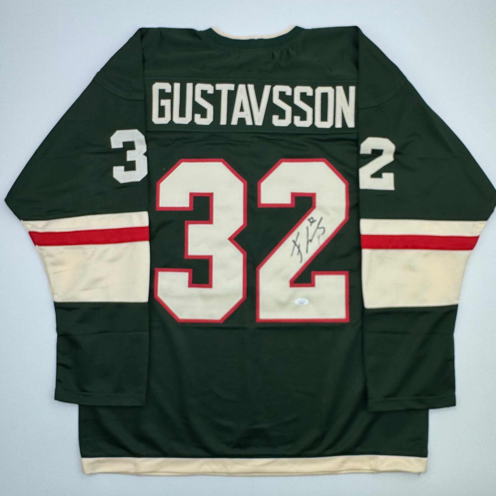 autographed-signed-filip-gustavsson-minnesota-green-hockey-jersey-jsa-coa