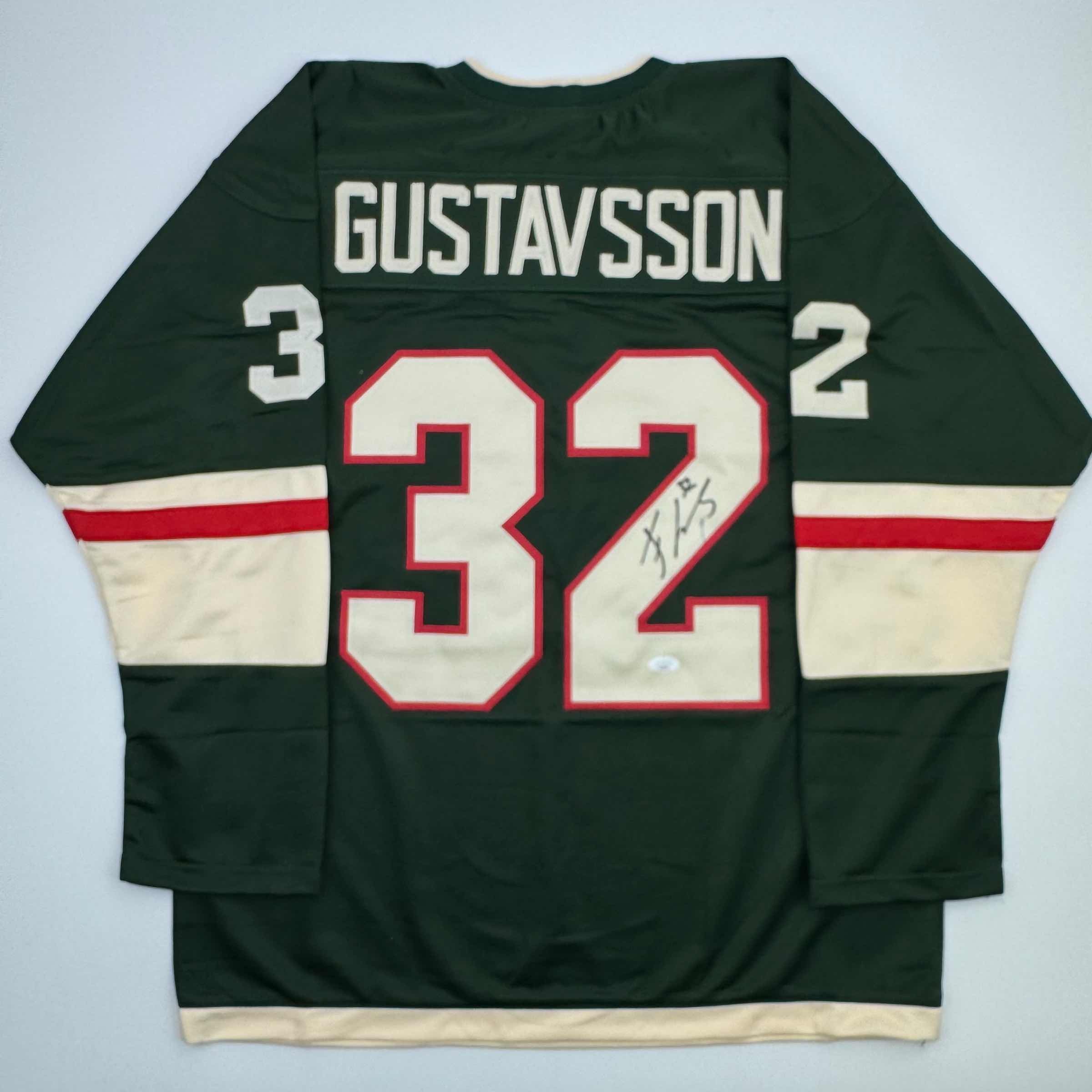 autographed-signed-filip-gustavsson-minnesota-green-hockey-jersey-jsa-coa