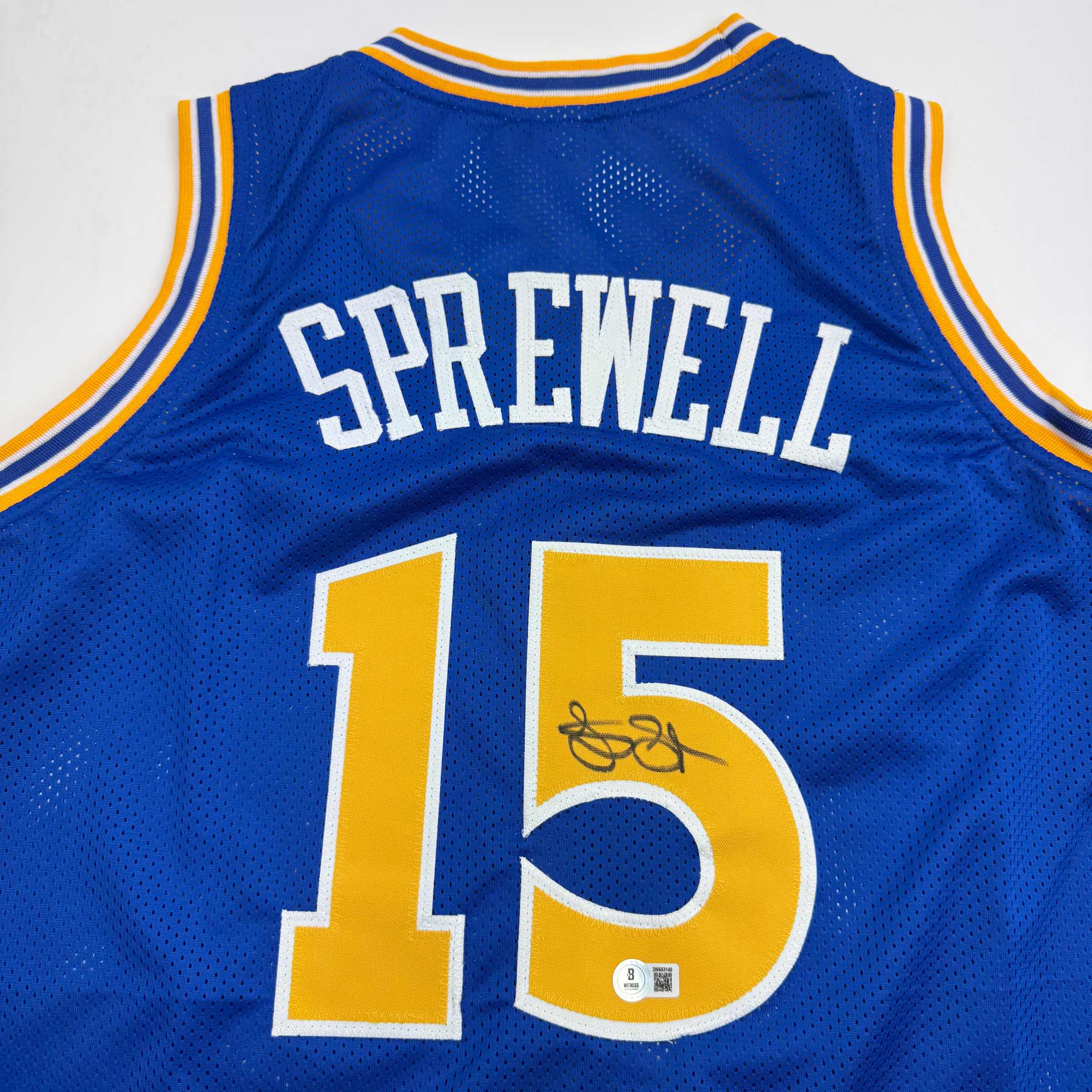 autographed-signed-latrell-sprewell-golden-state-blue-basketball-jersey-beckett-bas-coa