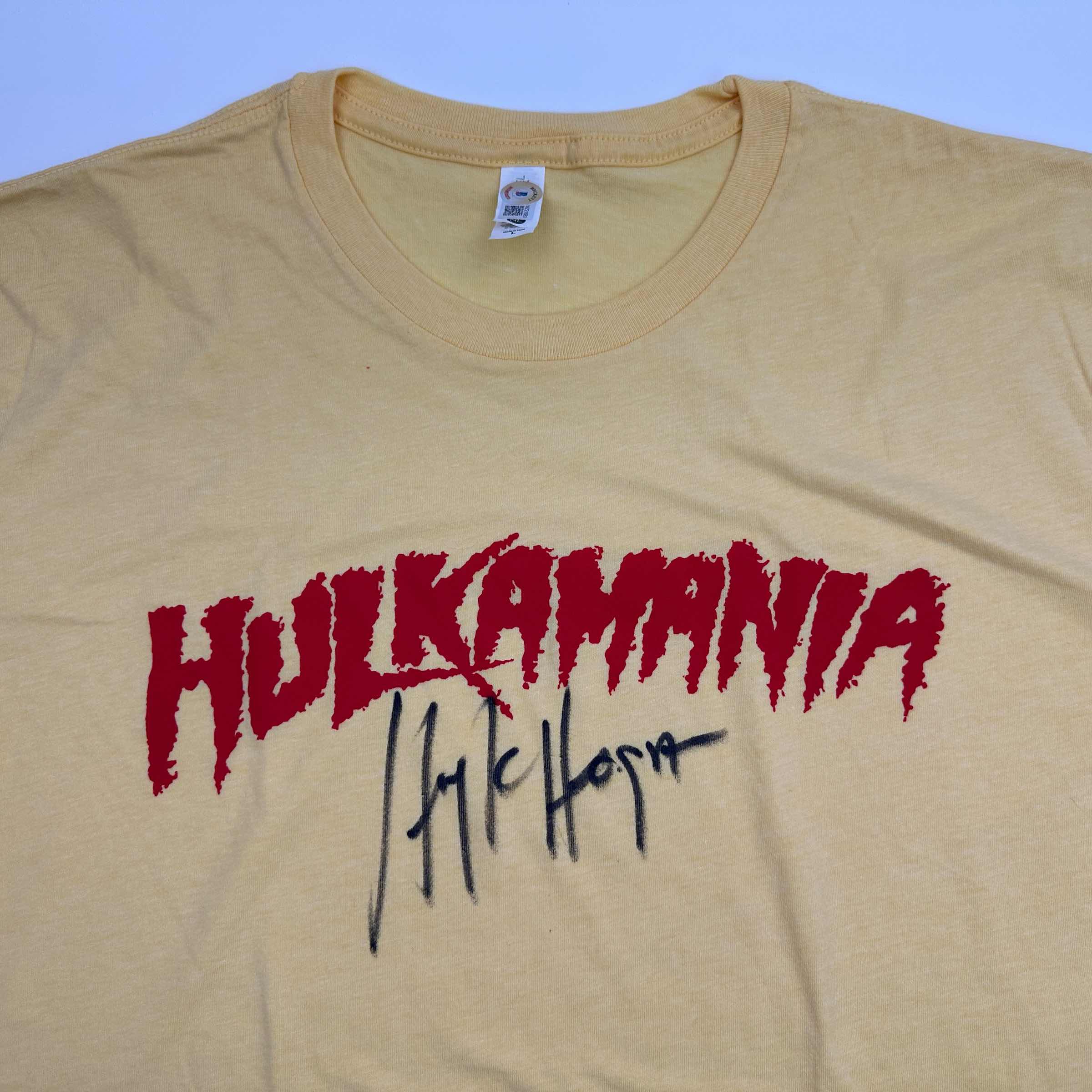autographed-signed-hulk-hogan-hulkamania-yellow-wwe-wrestling-shirt-t-shirt-beckett-bas-coa