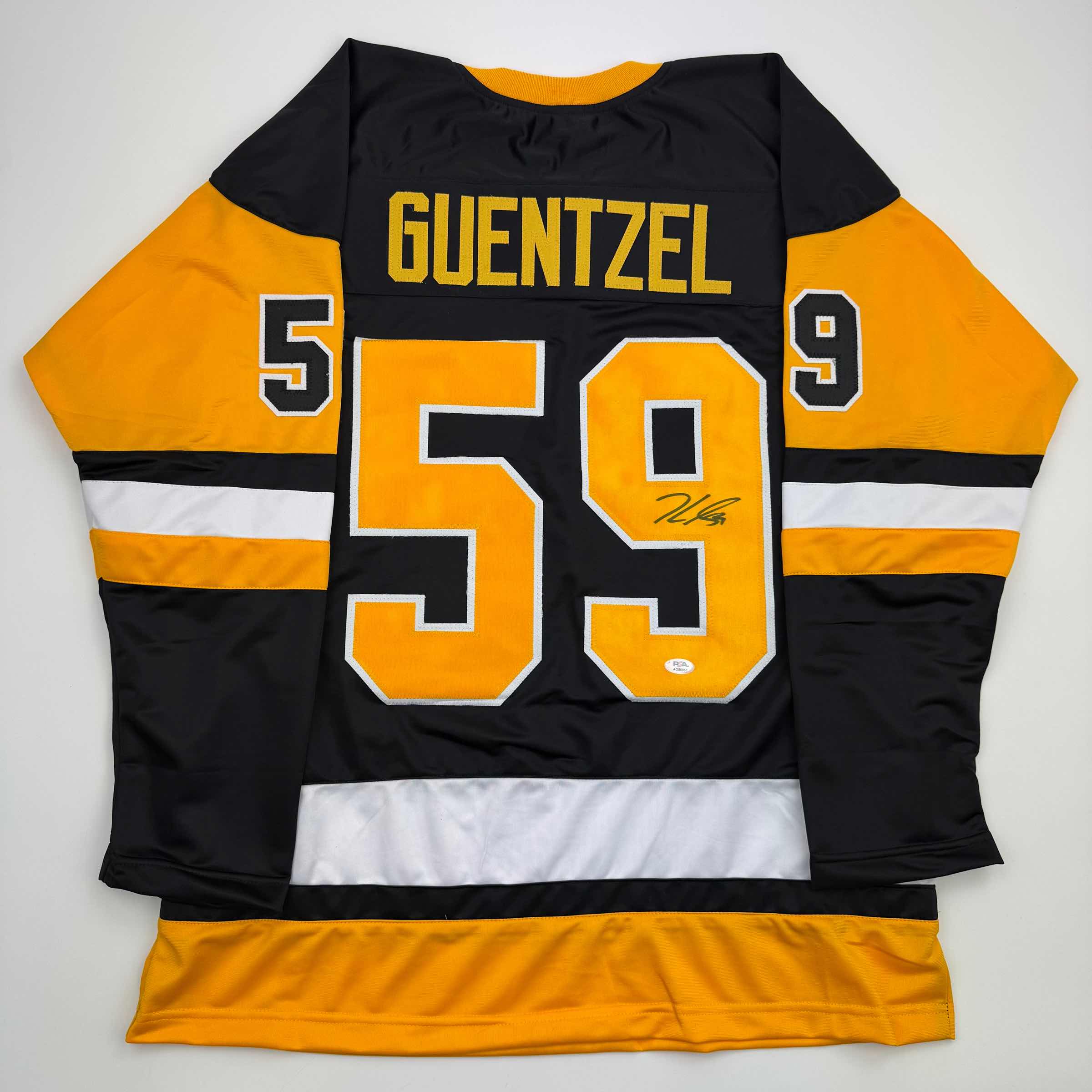 autographed-signed-jake-guentzel-pittsburgh-black-hockey-jersey-psa-coa