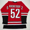 autographed-signed-pyotr-kochetkov-carolina-red-hockey-jersey-jsa-coa