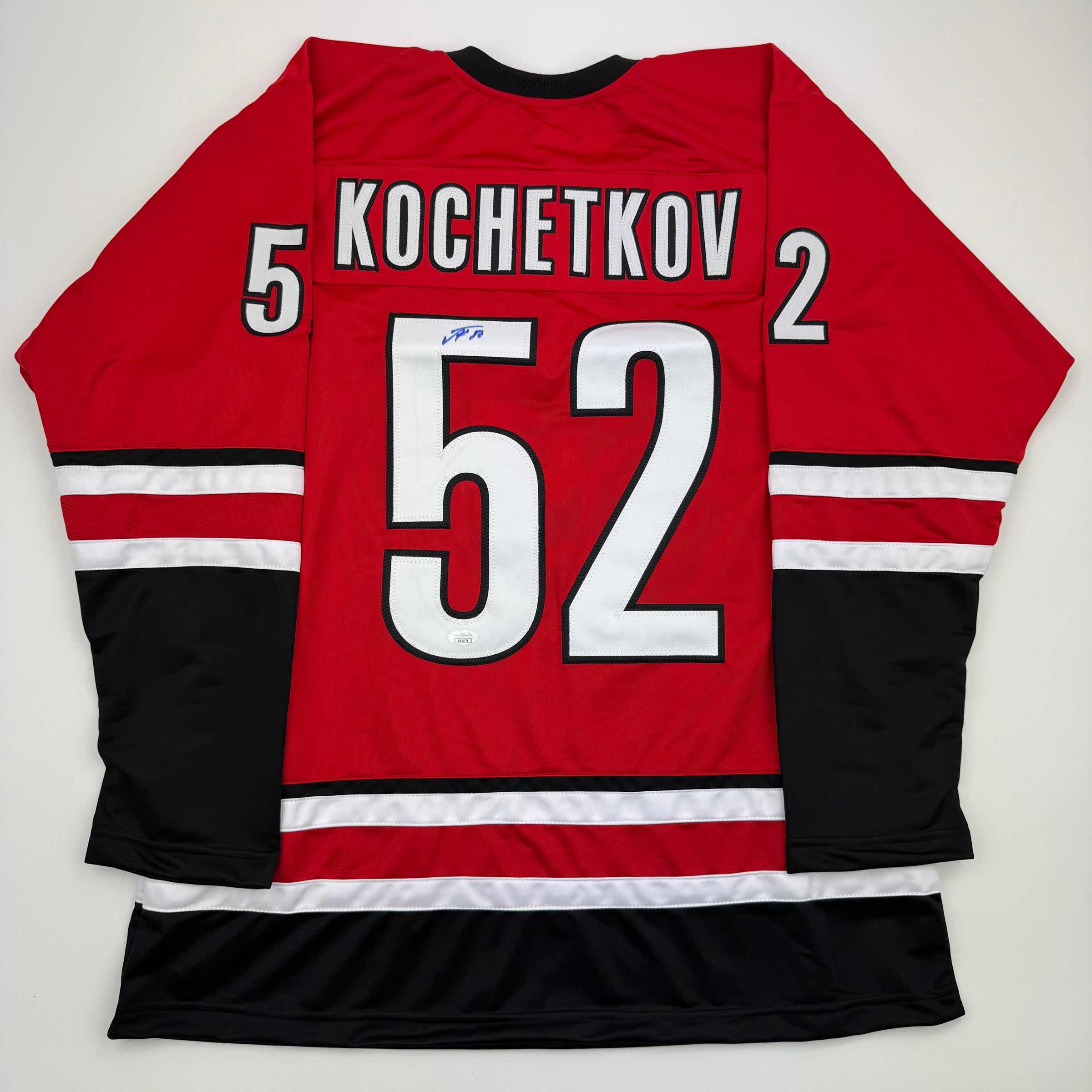 autographed-signed-pyotr-kochetkov-carolina-red-hockey-jersey-jsa-coa