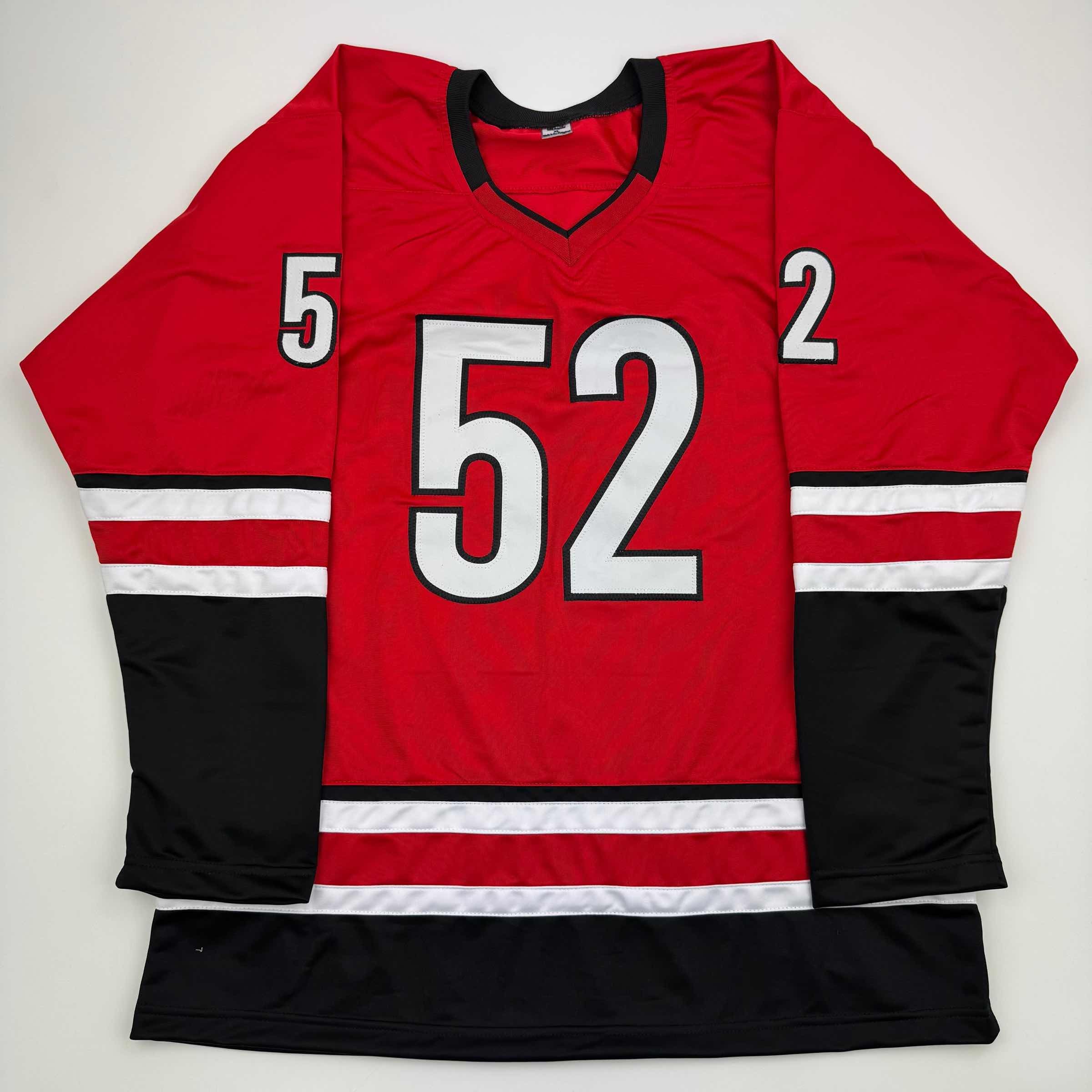 autographed-signed-pyotr-kochetkov-carolina-red-hockey-jersey-jsa-coa
