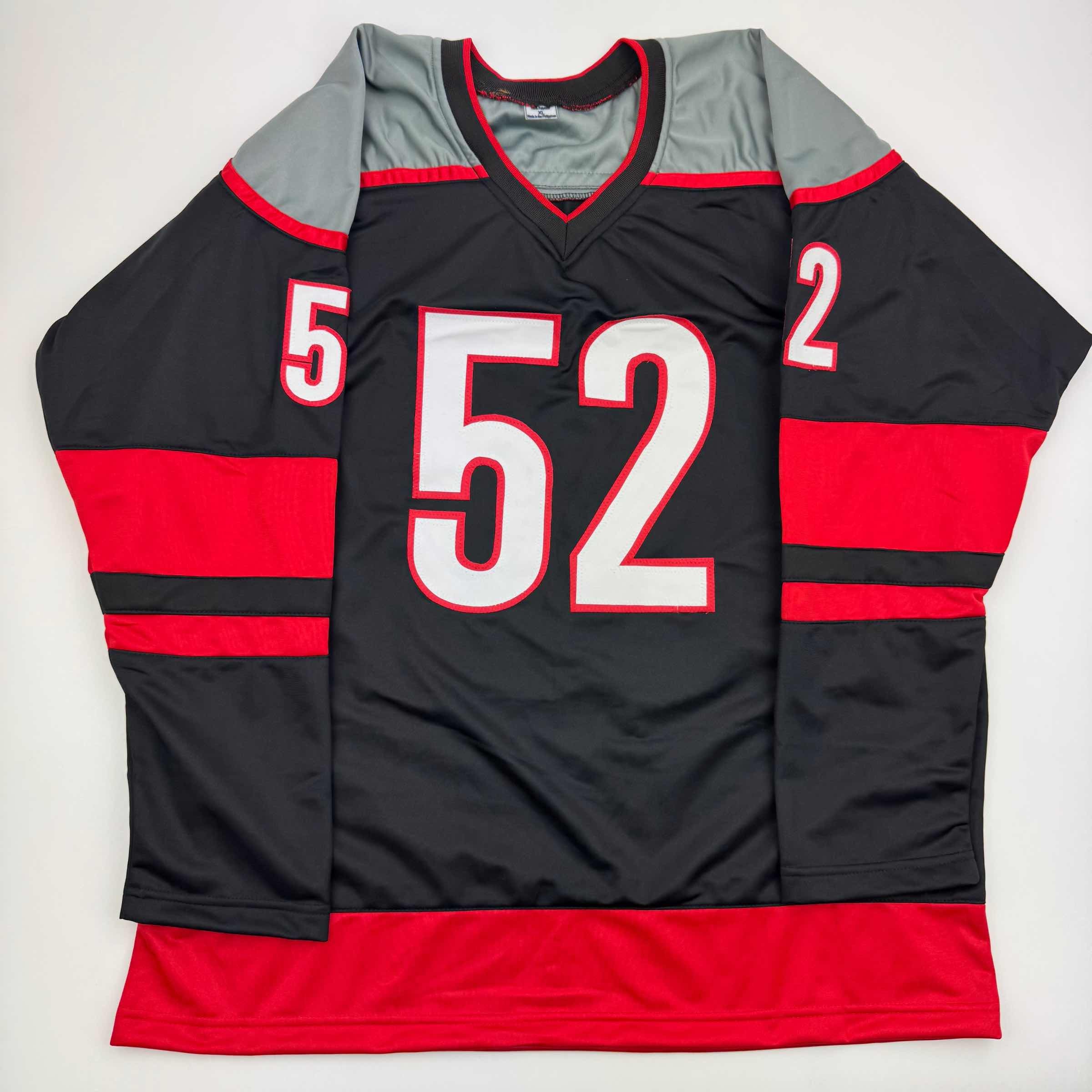 autographed-signed-pyotr-kochetkov-carolina-black-hockey-jersey-jsa-coa