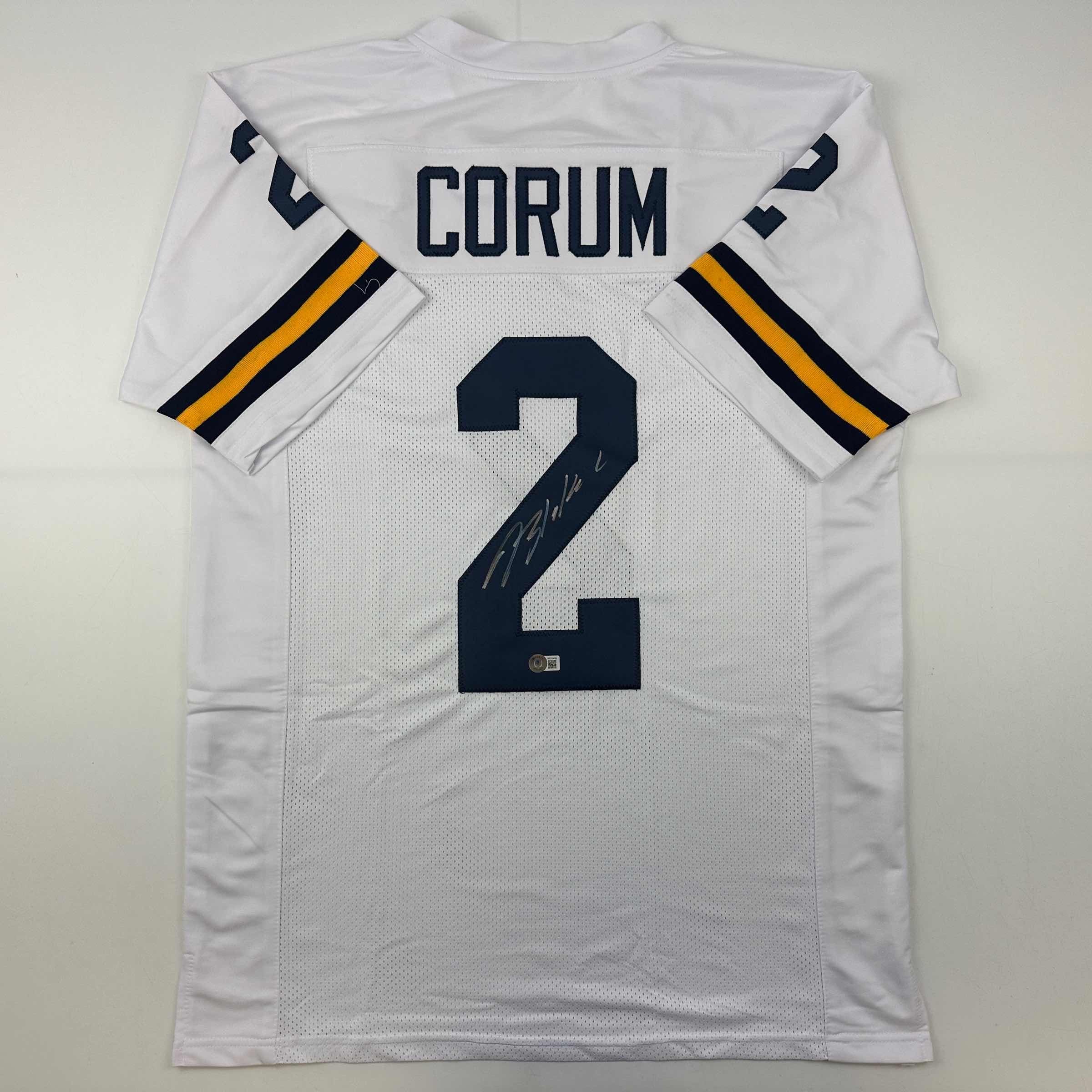 autographed-signed-blake-corum-michigan-white-college-football-jersey-beckett-bas-coa