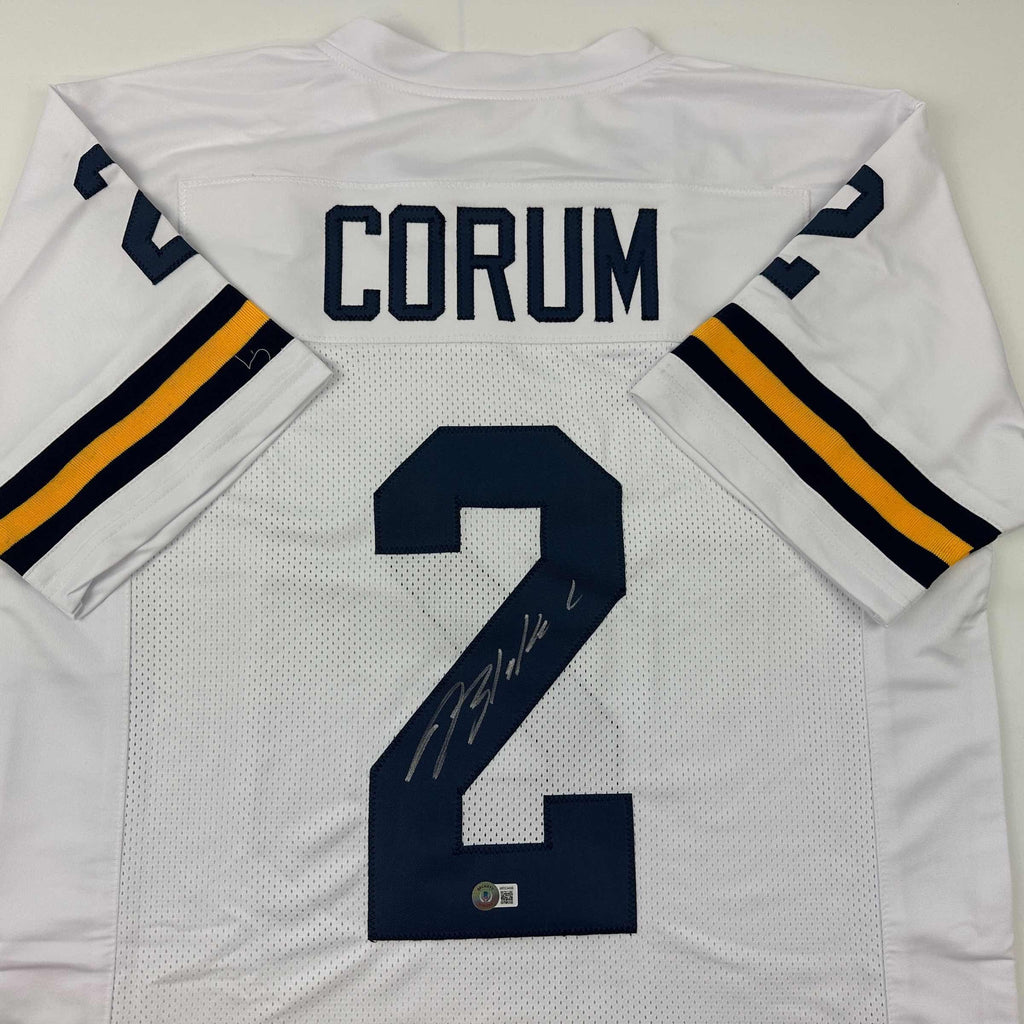 autographed-signed-blake-corum-michigan-white-college-football-jersey-beckett-bas-coa