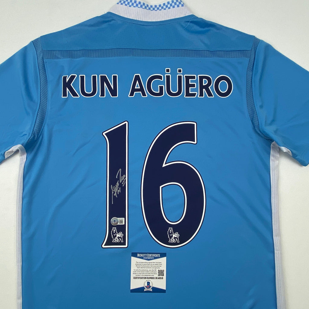 autographed-signed-sergio-kun-aguero-manchester-city-blue-soccer-futbol-jersey-beckett-bas-coa