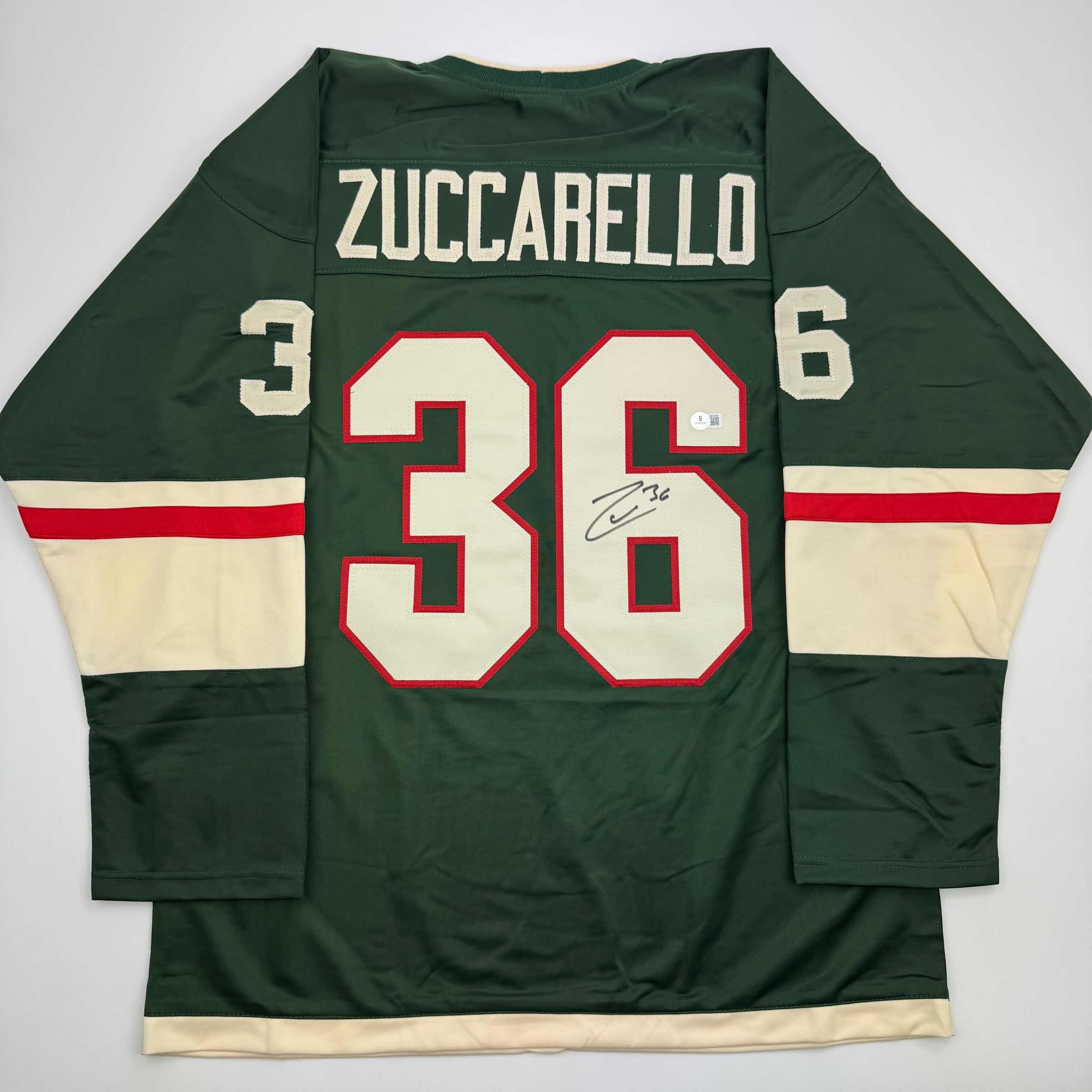 autographed-signed-mats-zuccarello-minnesota-green-hockey-jersey-beckett-bas-coa