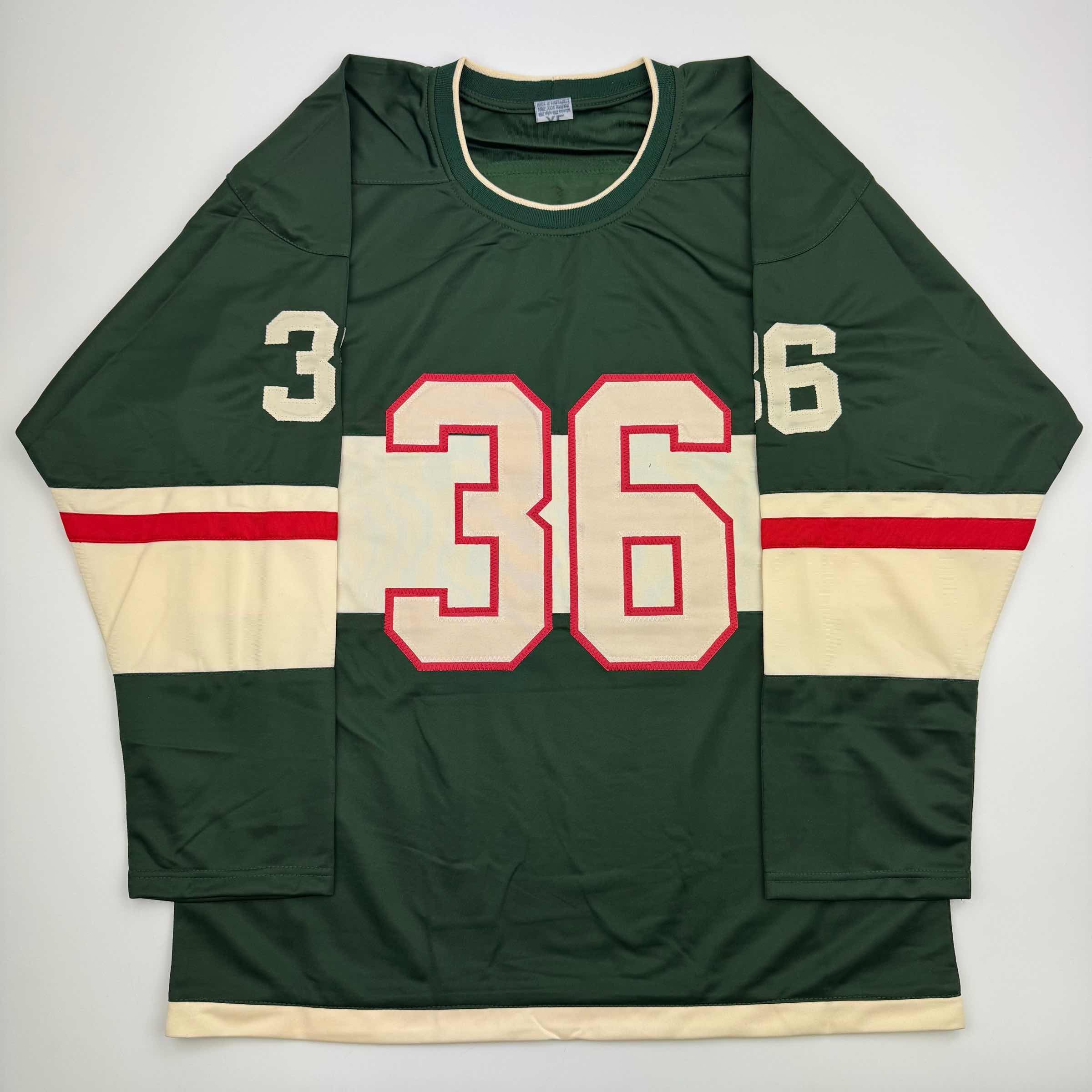 autographed-signed-mats-zuccarello-minnesota-green-hockey-jersey-beckett-bas-coa