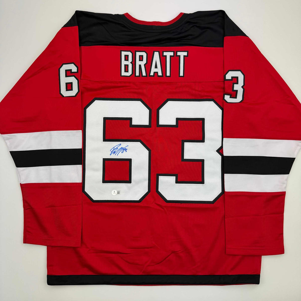 autographed-signed-jesper-bratt-new-jersey-red-hockey-jersey-beckett-bas-coa