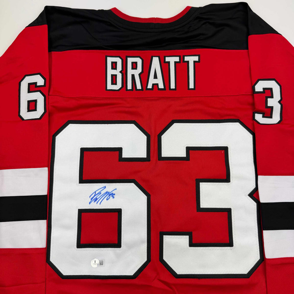 autographed-signed-jesper-bratt-new-jersey-red-hockey-jersey-beckett-bas-coa