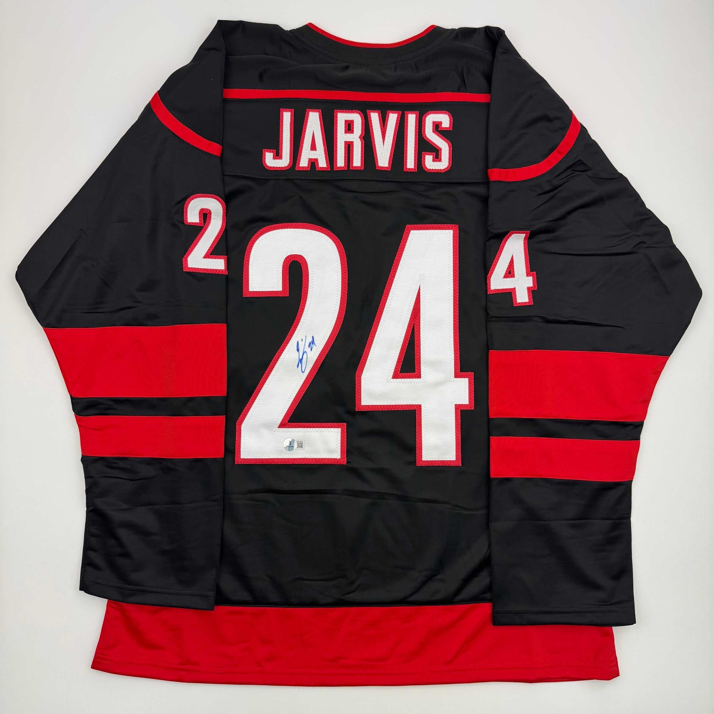 autographed-signed-seth-jarvis-carolina-black-hockey-jersey-beckett-bas-coa