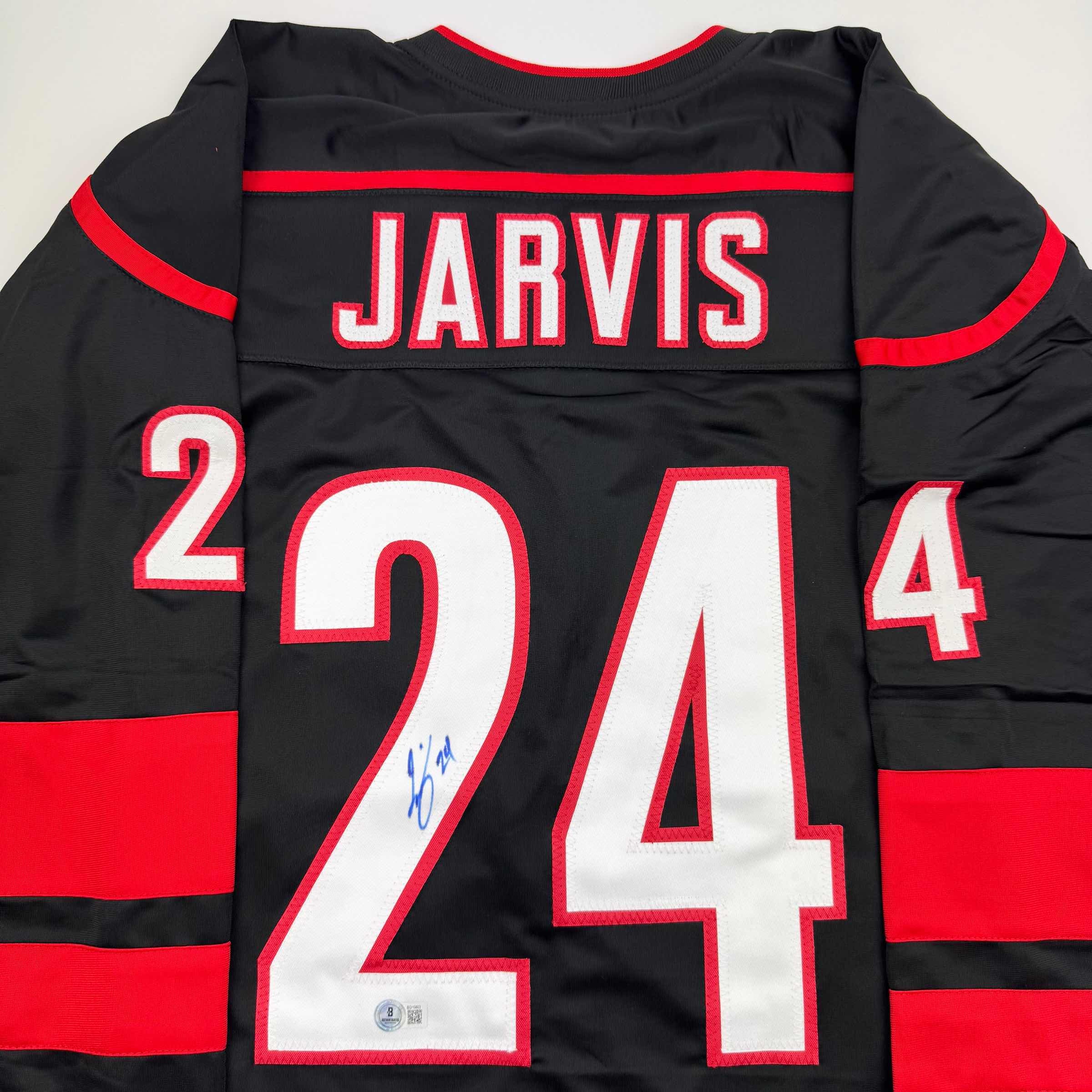 autographed-signed-seth-jarvis-carolina-black-hockey-jersey-beckett-bas-coa