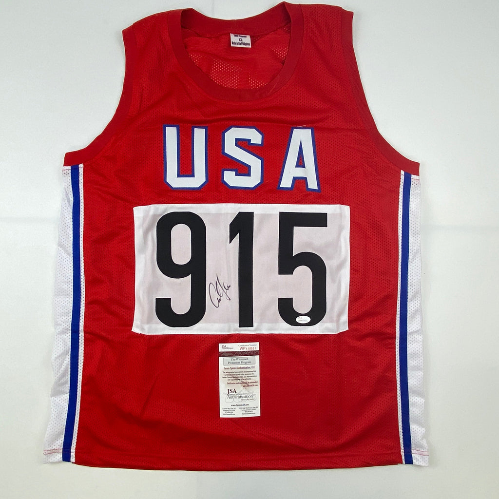 autographed-signed-carl-lewis-track-star-united-states-usa-olympics-jersey-jsa-coa
