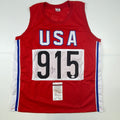 autographed-signed-carl-lewis-track-star-united-states-usa-olympics-jersey-jsa-coa