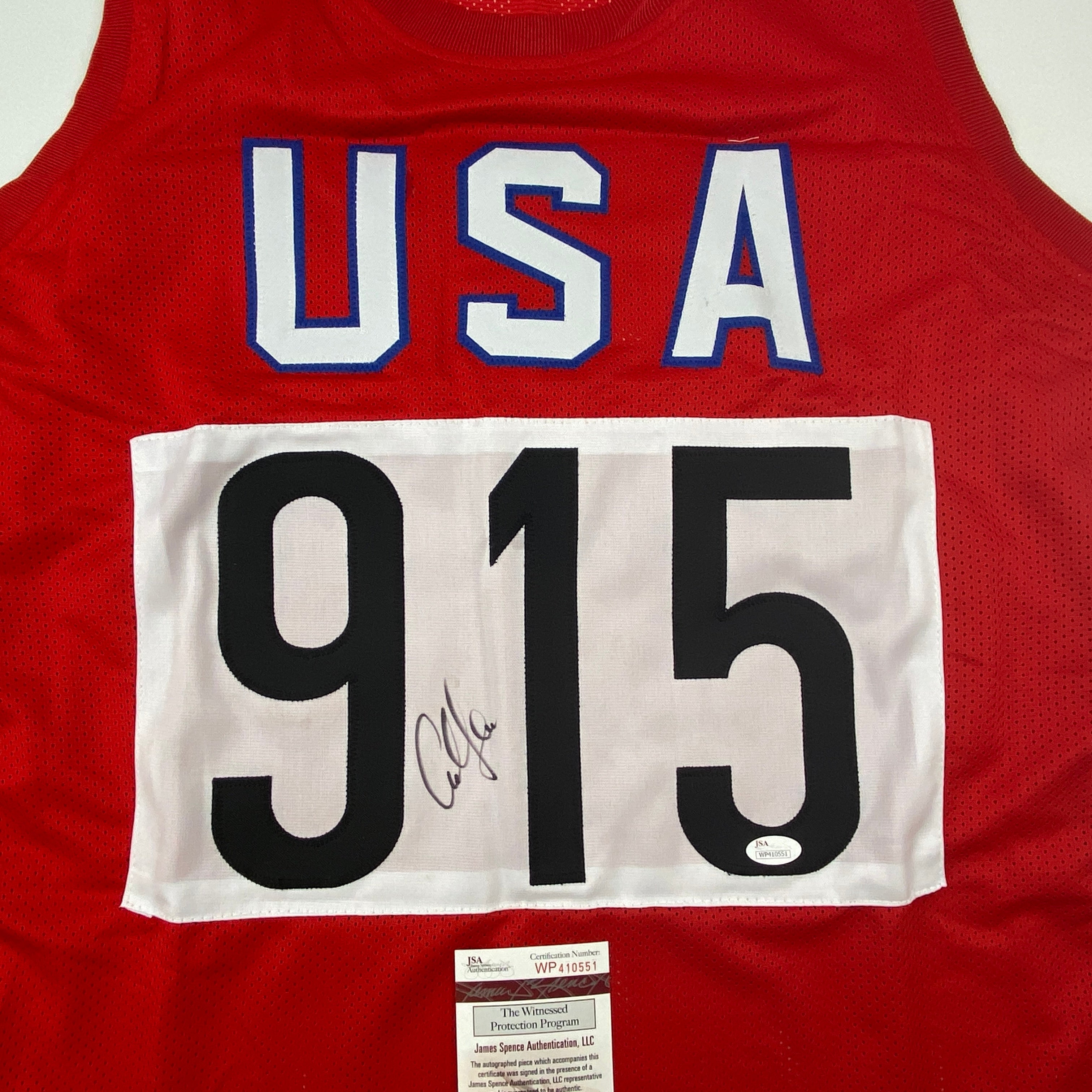 autographed-signed-carl-lewis-track-star-united-states-usa-olympics-jersey-jsa-coa
