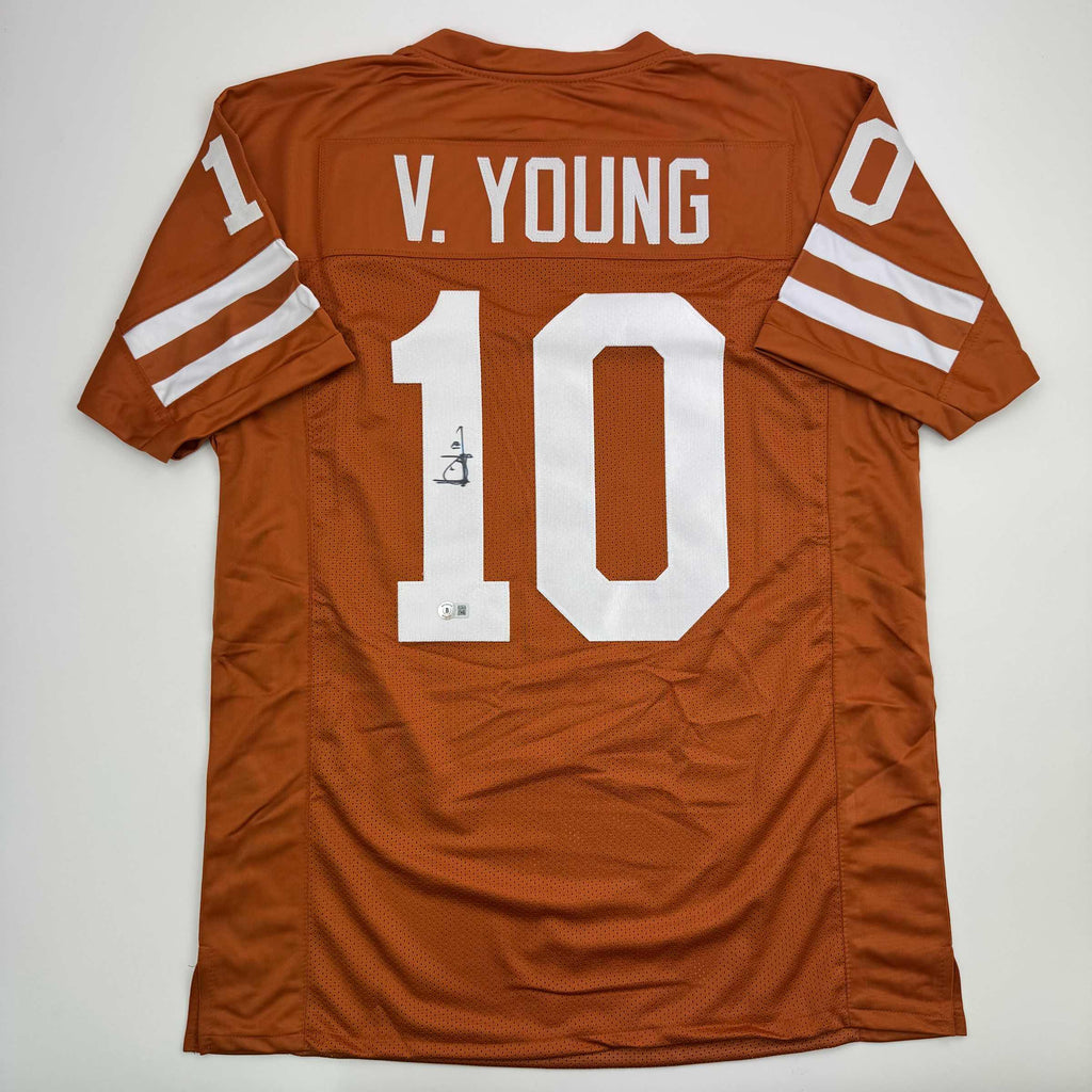autographed-signed-vince-young-texas-orange-college-football-jersey-beckett-bas-coa