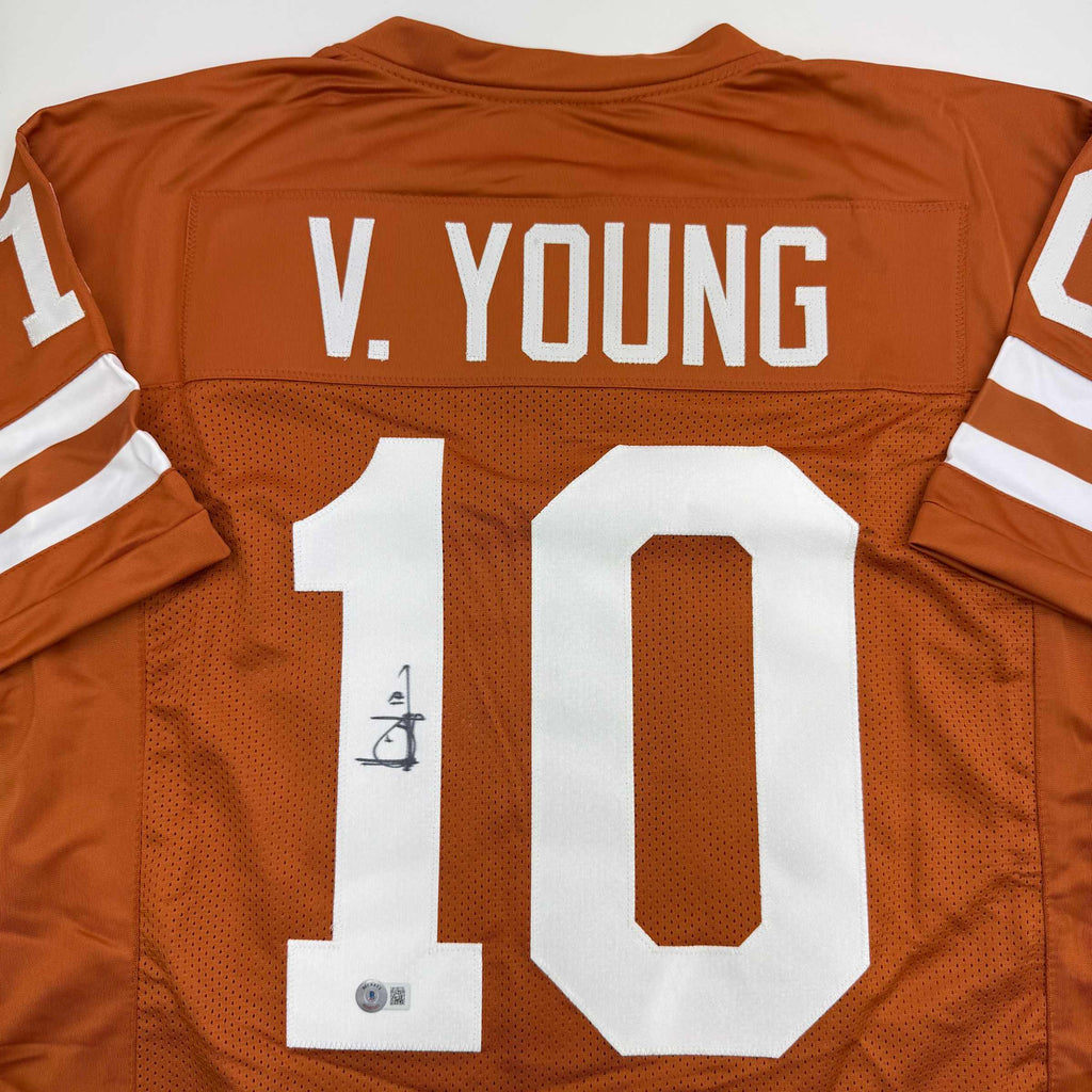 autographed-signed-vince-young-texas-orange-college-football-jersey-beckett-bas-coa