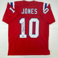 autographed-signed-mac-jones-new-england-red-football-jersey-beckett-bas-coa