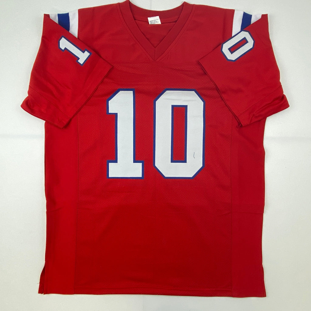 autographed-signed-mac-jones-new-england-red-football-jersey-beckett-bas-coa