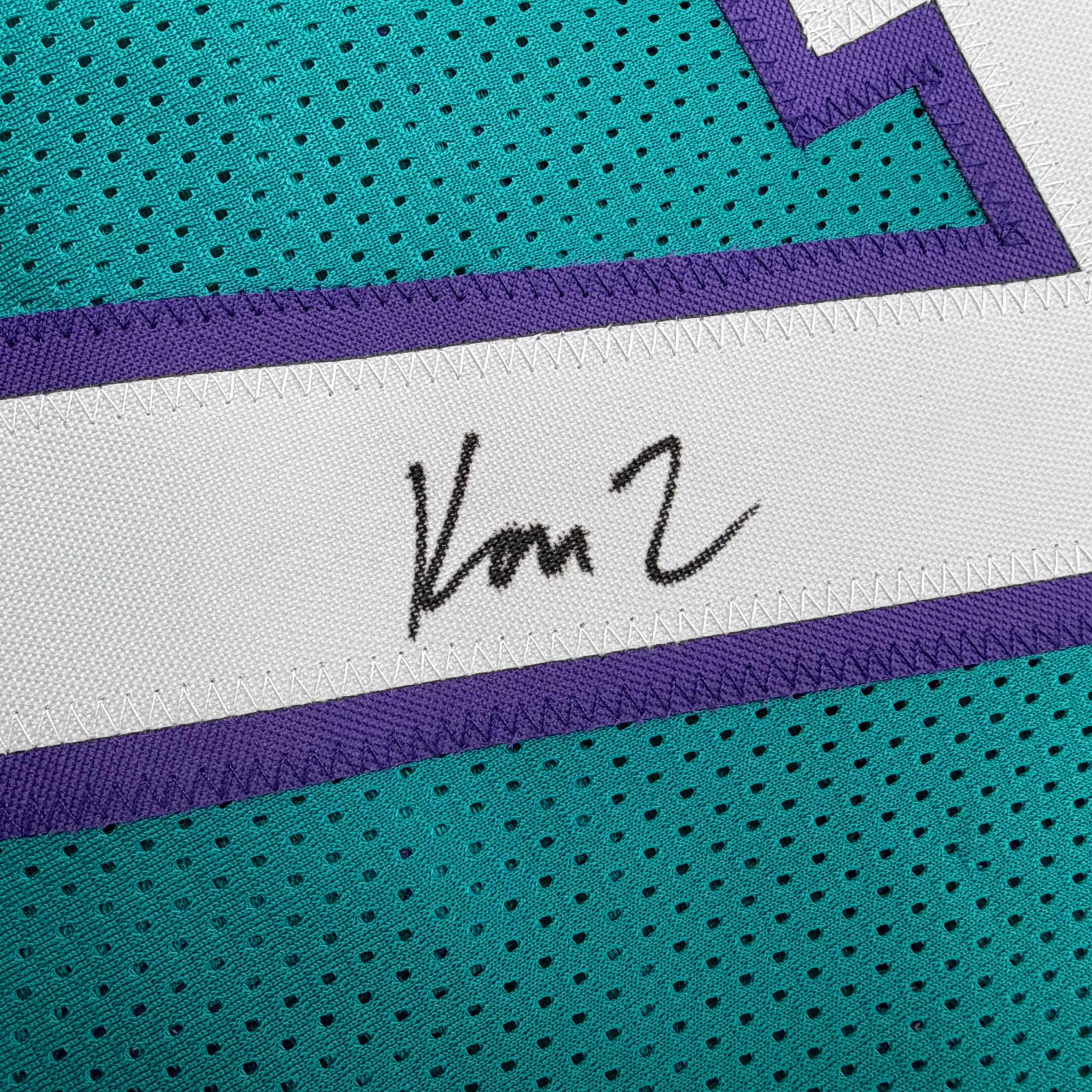 autographed-signed-kon-knueppel-charlotte-teal-basketball-jersey-jsa-coa