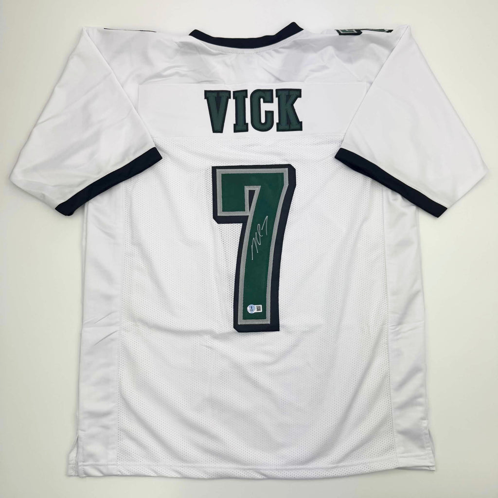 autographed-signed-michael-mike-vick-philadelphia-white-football-jersey-beckett-bas-coa