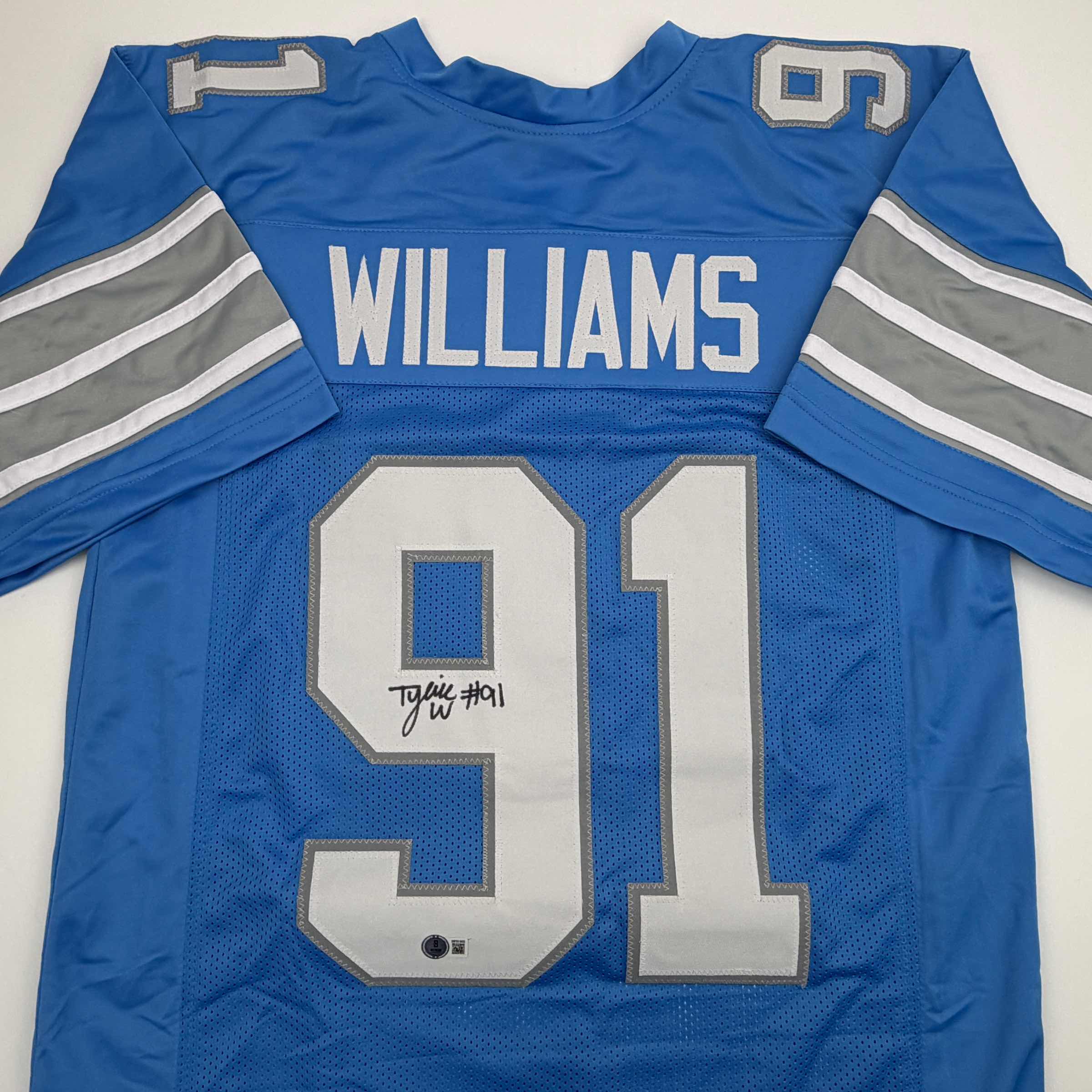 autographed-signed-tyleik-williams-detroit-blue-football-jersey-beckett-bas-coa
