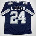 autographed-signed-larry-brown-dallas-blue-football-jersey-beckett-bas-coa