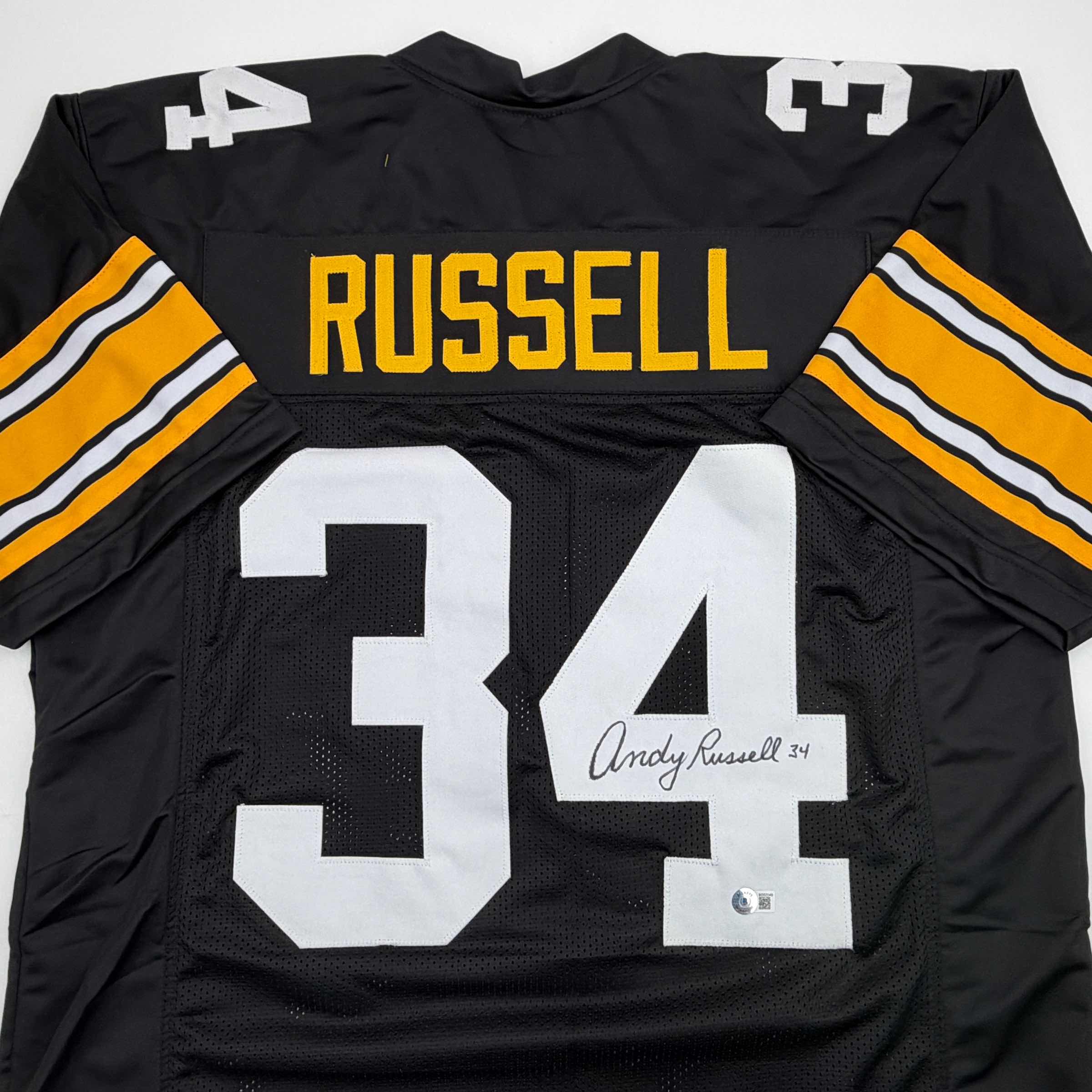 autographed-signed-andy-russell-pittsburgh-black-football-jersey-beckett-bas-coa