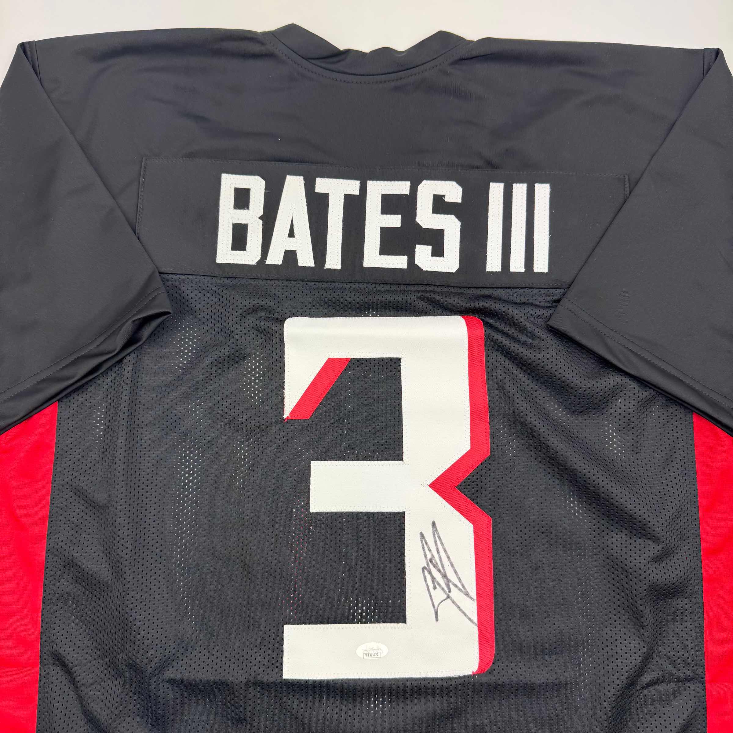 autographed-signed-jessie-bates-iii-atlanta-black-football-jersey-jsa-coa