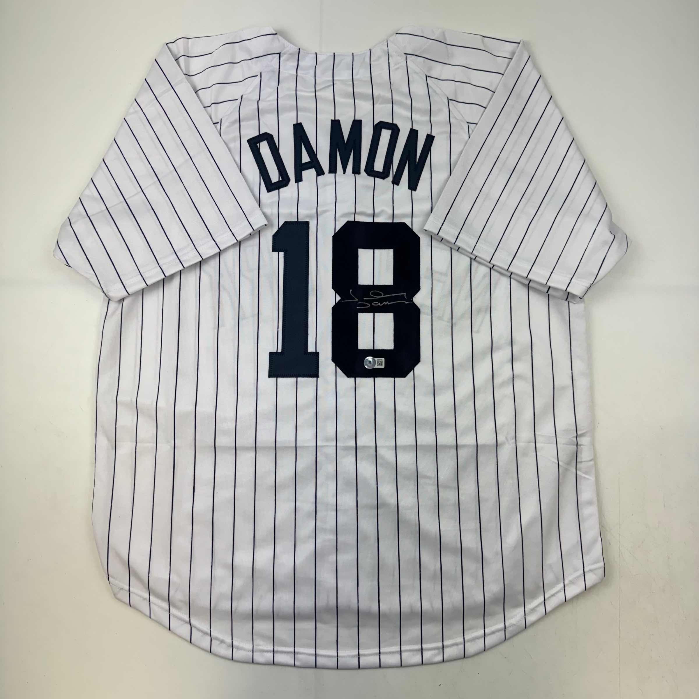 autographed-signed-johnny-damon-new-york-pinstripe-baseball-jersey-beckett-bas-coa