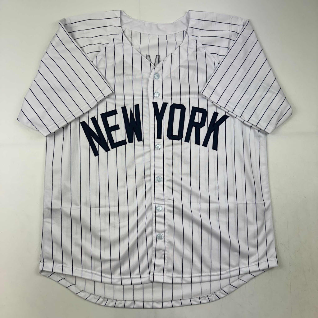autographed-signed-johnny-damon-new-york-pinstripe-baseball-jersey-beckett-bas-coa