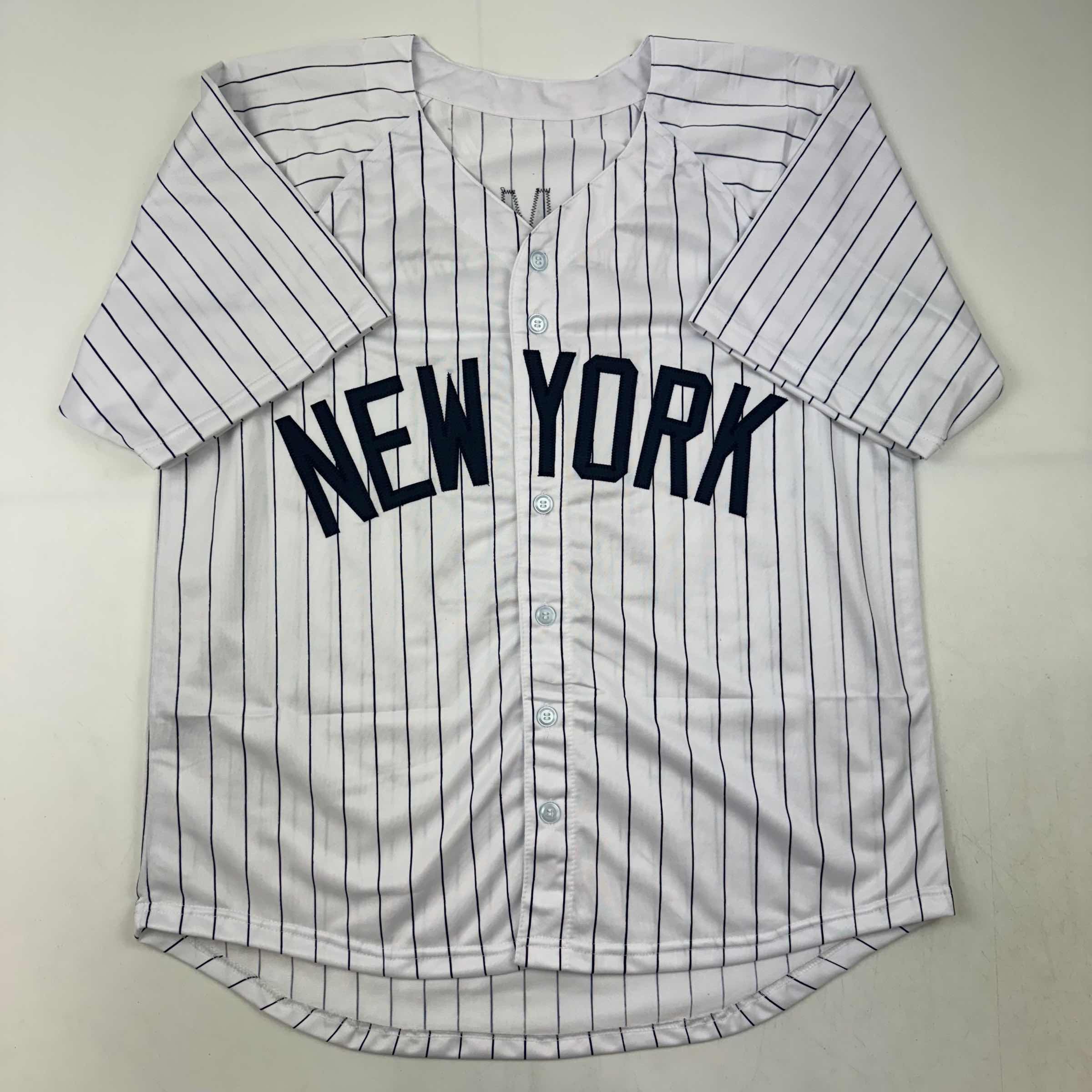 autographed-signed-johnny-damon-new-york-pinstripe-baseball-jersey-beckett-bas-coa