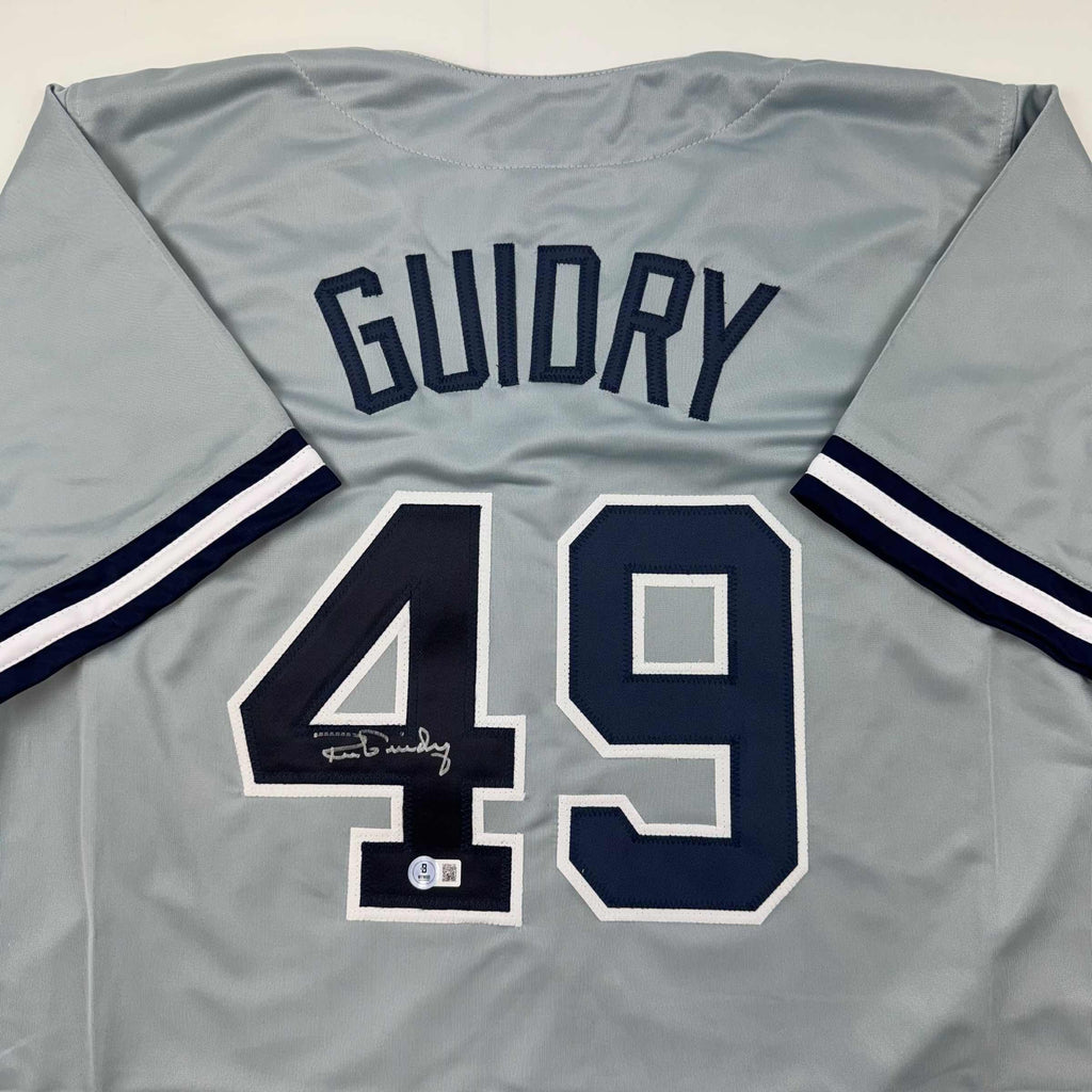 autographed-signed-ron-guidry-new-york-grey-baseball-jersey-beckett-bas-coa