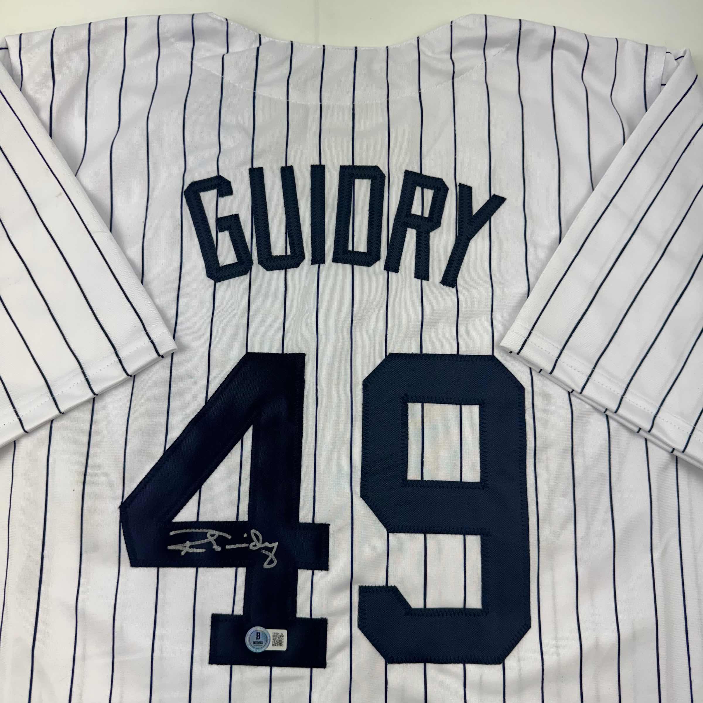 autographed-signed-ron-guidry-new-york-pinstripe-baseball-jersey-beckett-bas-coa