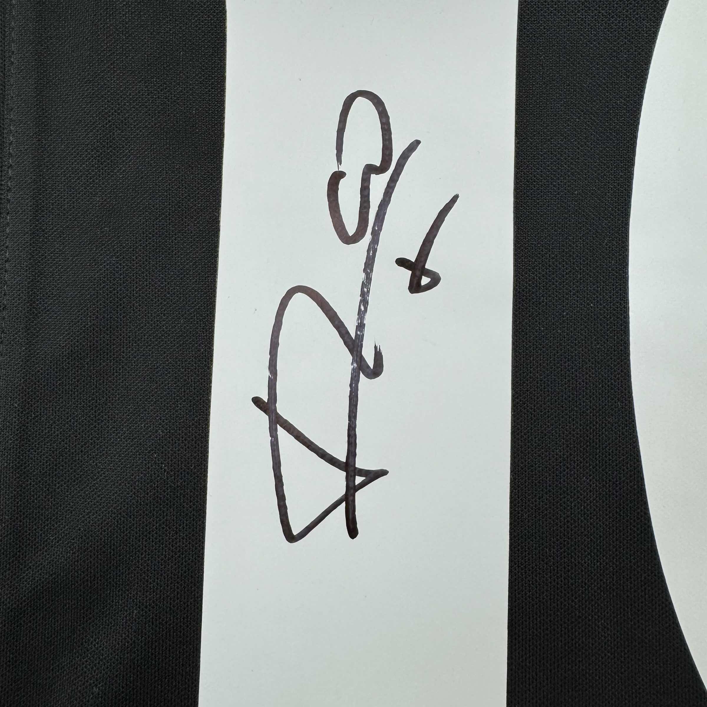 autographed-signed-luis-figo-real-madrid-black-soccer-jersey-beckett-bas-coa