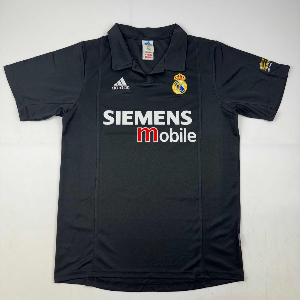 autographed-signed-luis-figo-real-madrid-black-soccer-jersey-beckett-bas-coa
