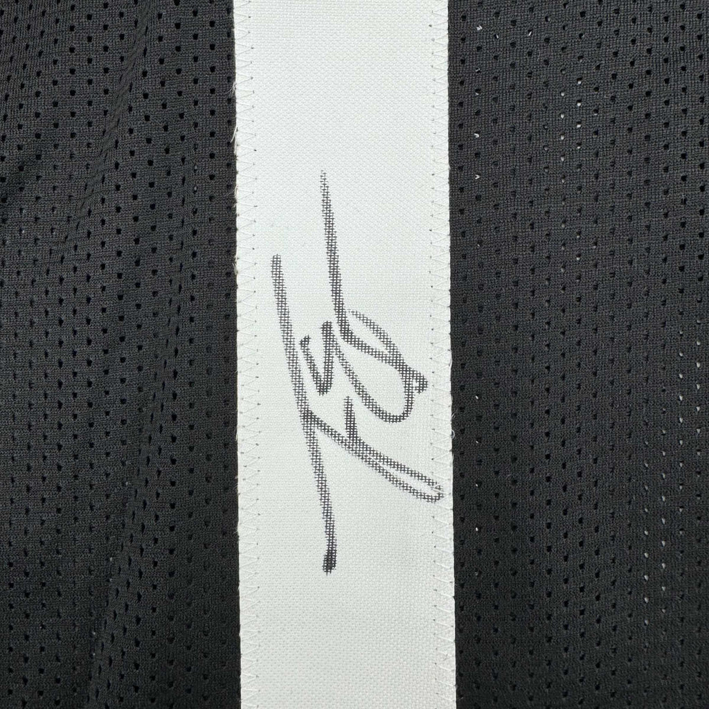 autographed-signed-travis-etienne-jr-jacksonville-black-football-jersey-beckett-bas-coa