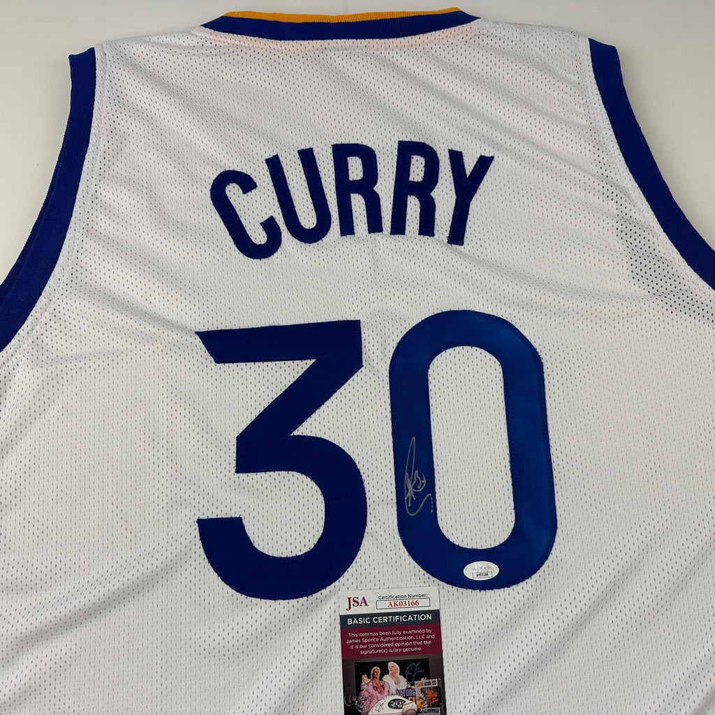 autographed-signed-stephen-steph-curry-golden-state-white-basketball-jersey-jsa-coa