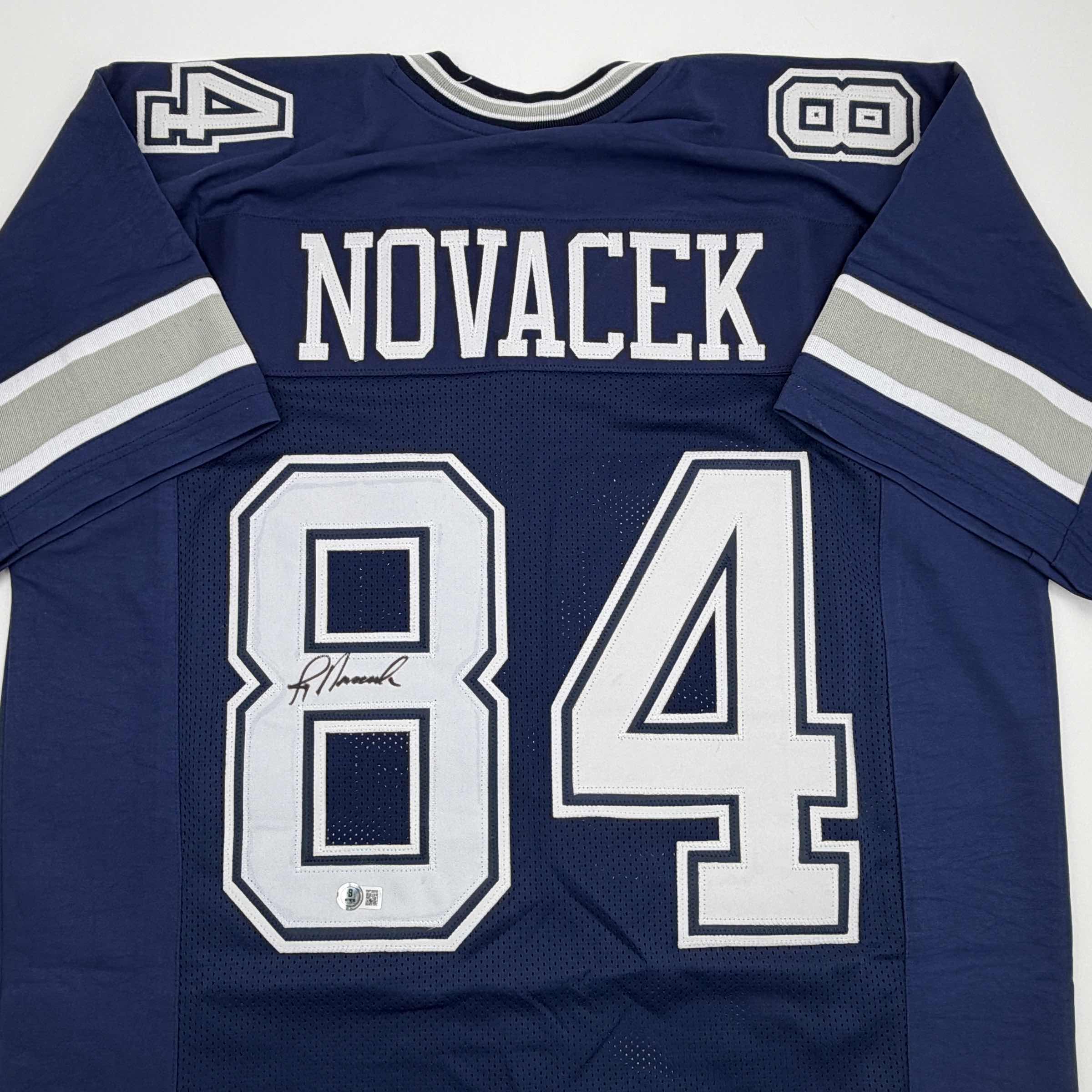 autographed-signed-jay-novacek-dallas-dark-blue-football-jersey-beckett-bas-coa