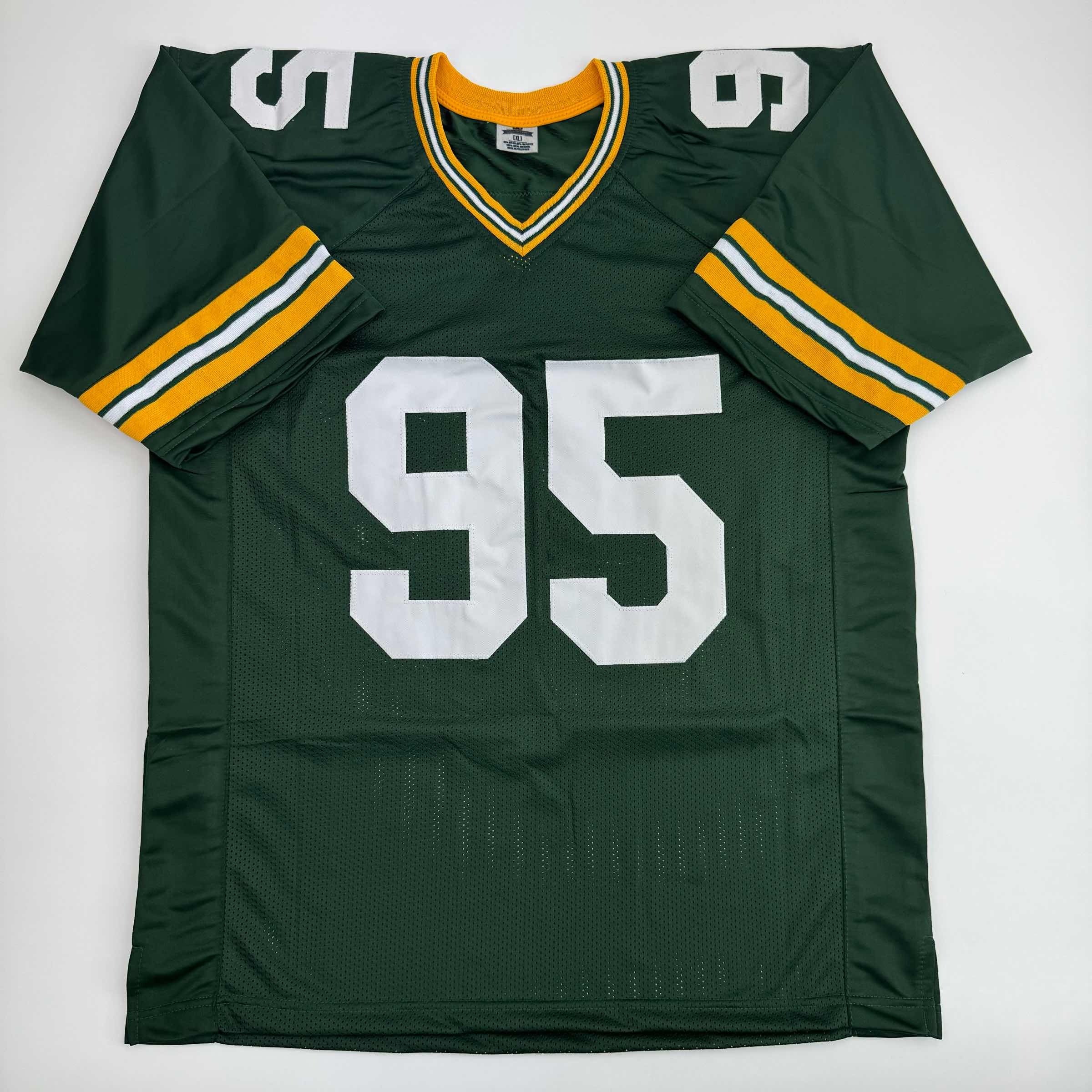 autographed-signed-devonte-wyatt-green-bay-green-football-jersey-jsa-coa
