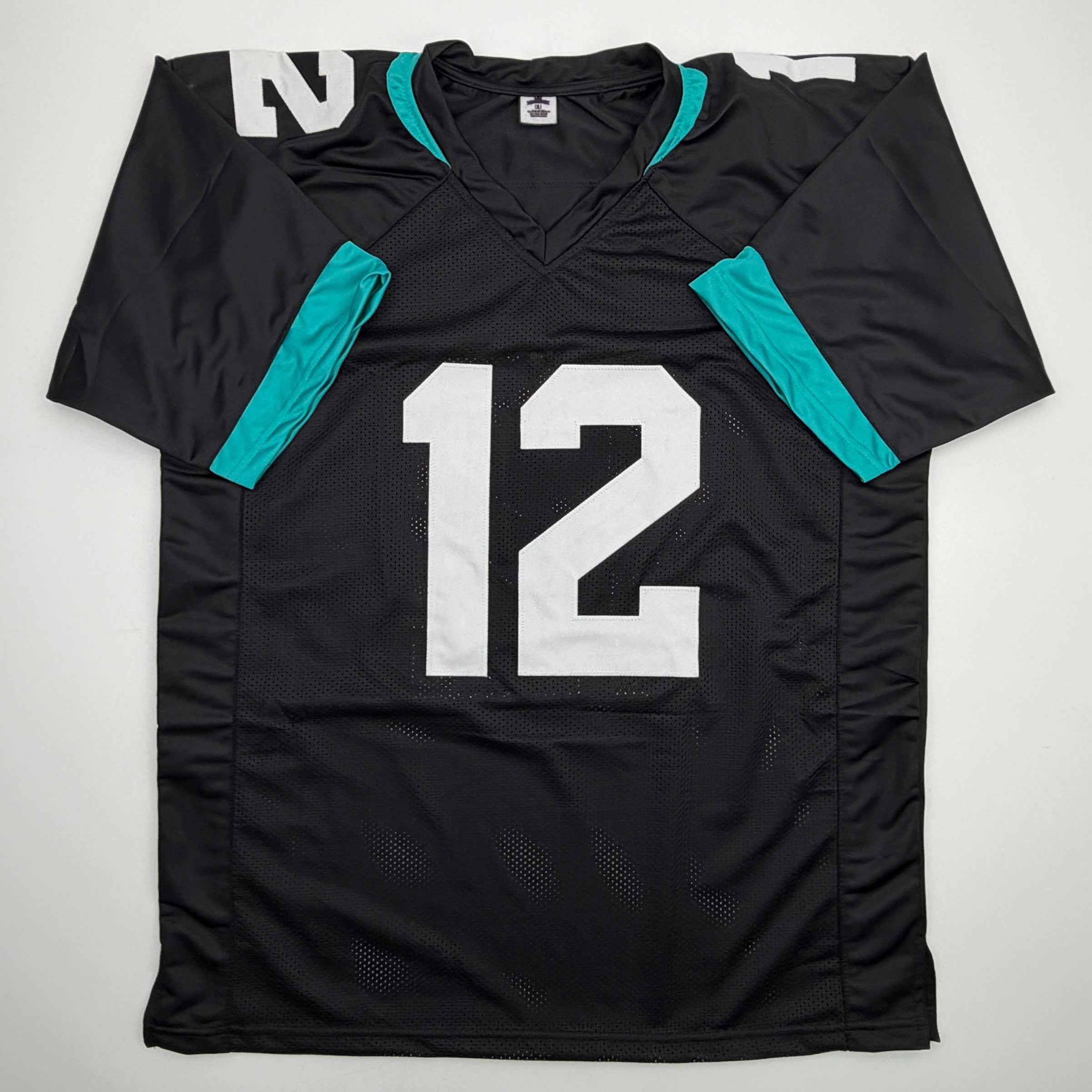 autographed-signed-travis-hunter-jacksonville-black-football-jersey-beckett-bas-coa